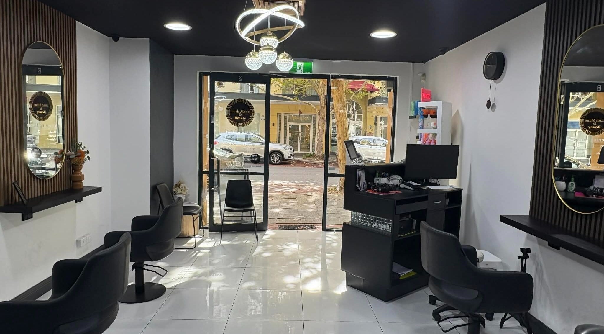 Elegant salon chairs and mirrors at Yasu Hair in Perth, Western Australia, AU. Modern and inviting space.