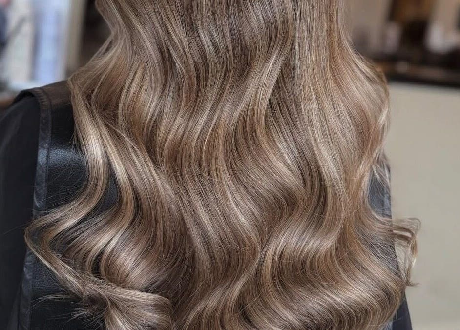 Elegant wavy hairstyle at Emily White Hair, Forest Hall, England, GB.