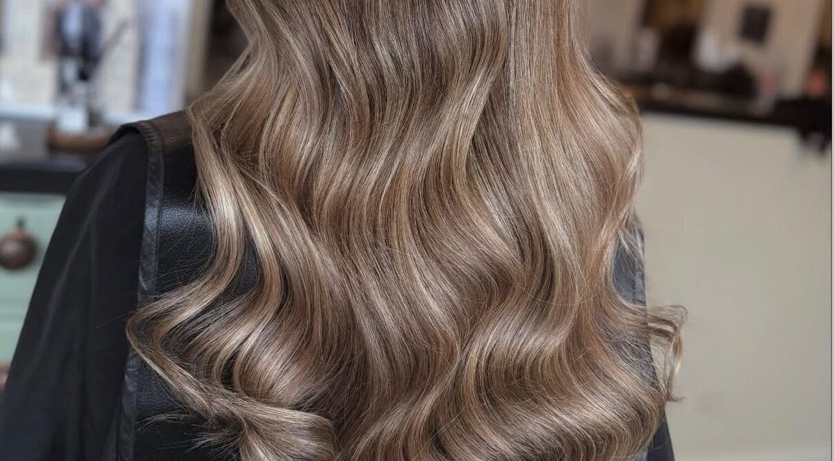 Elegant wavy hairstyle at Emily White Hair, Forest Hall, England, GB.