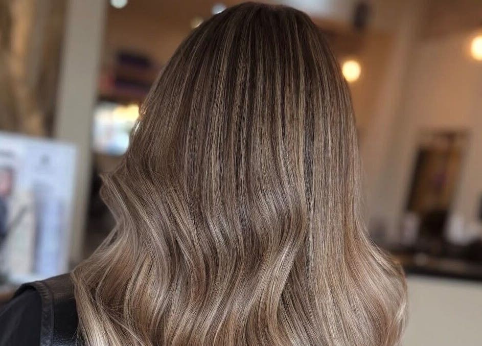 Brunette hair styled flawlessly at Emily White Hair, Forest Hall, England, GB salon.