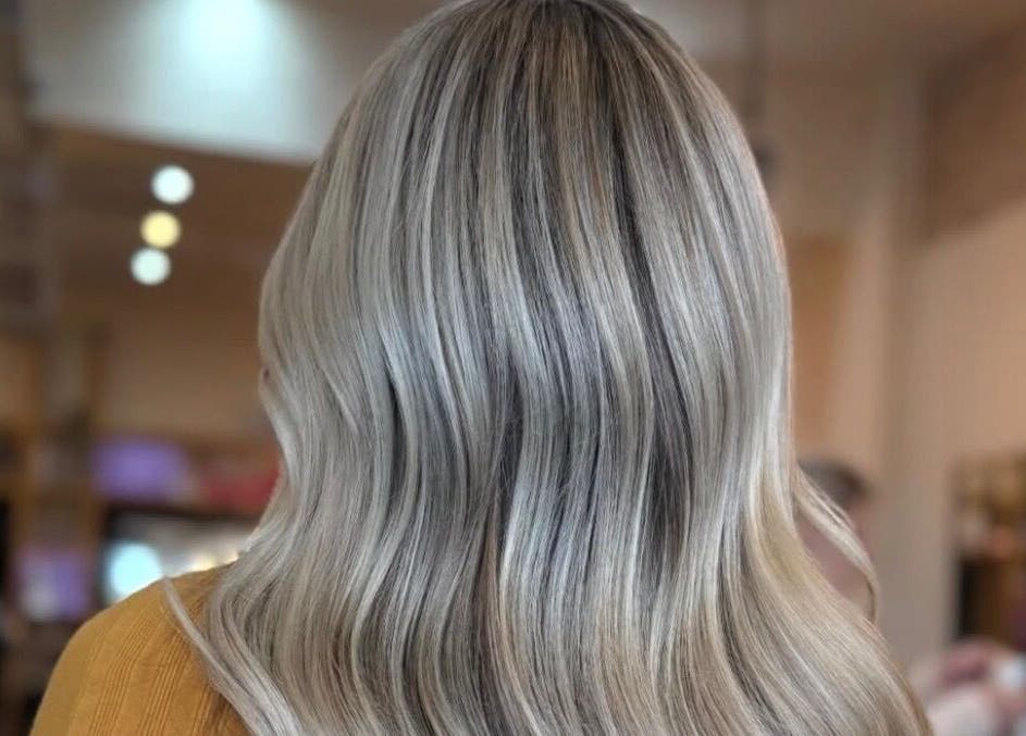 Silky blonde hair with soft waves at Emily White Hair, Forest Hall, England, GB.