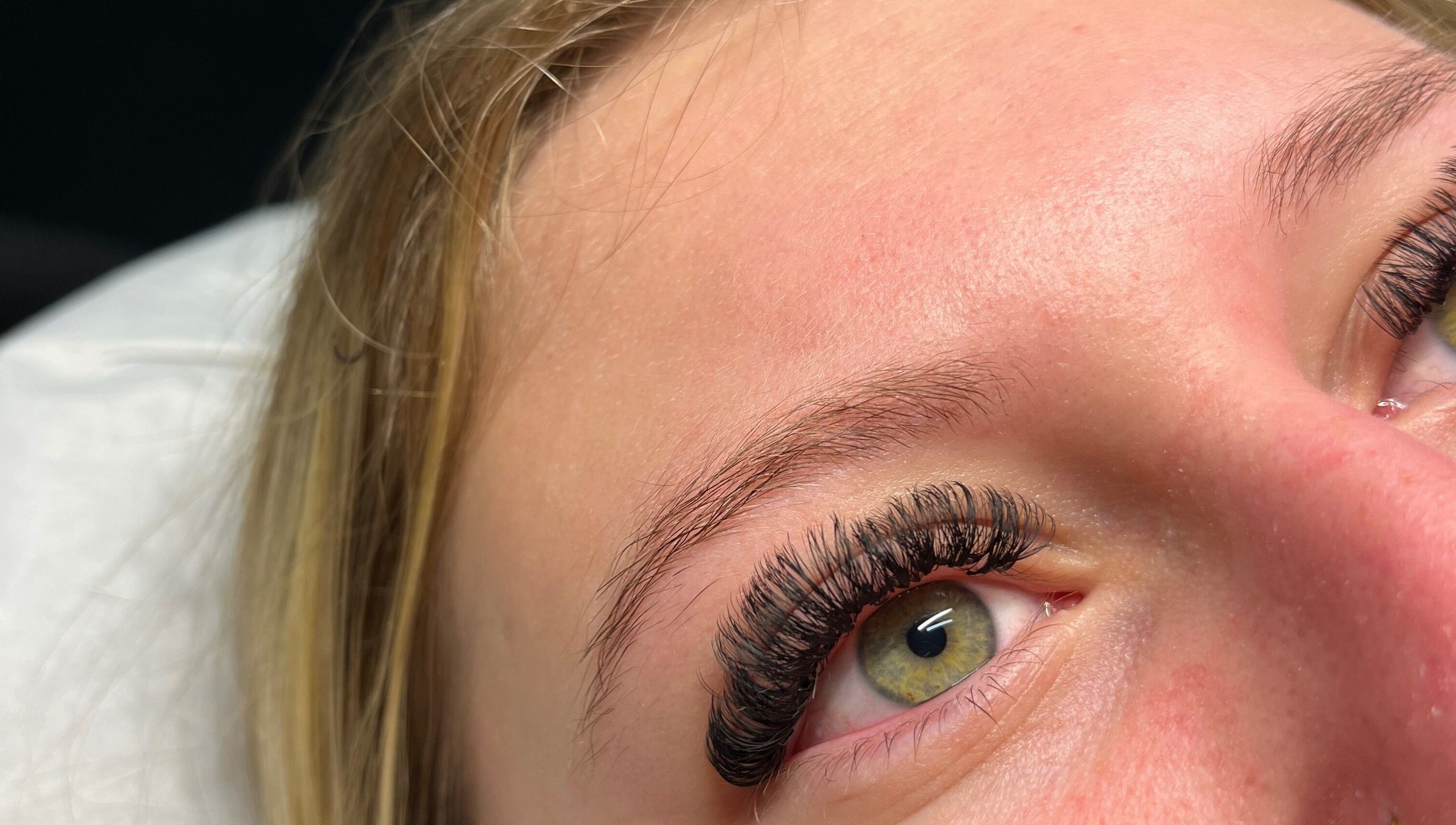Close-up of lush eyelash extensions at LashedByGrace, Brighton And Hove, England, GB.