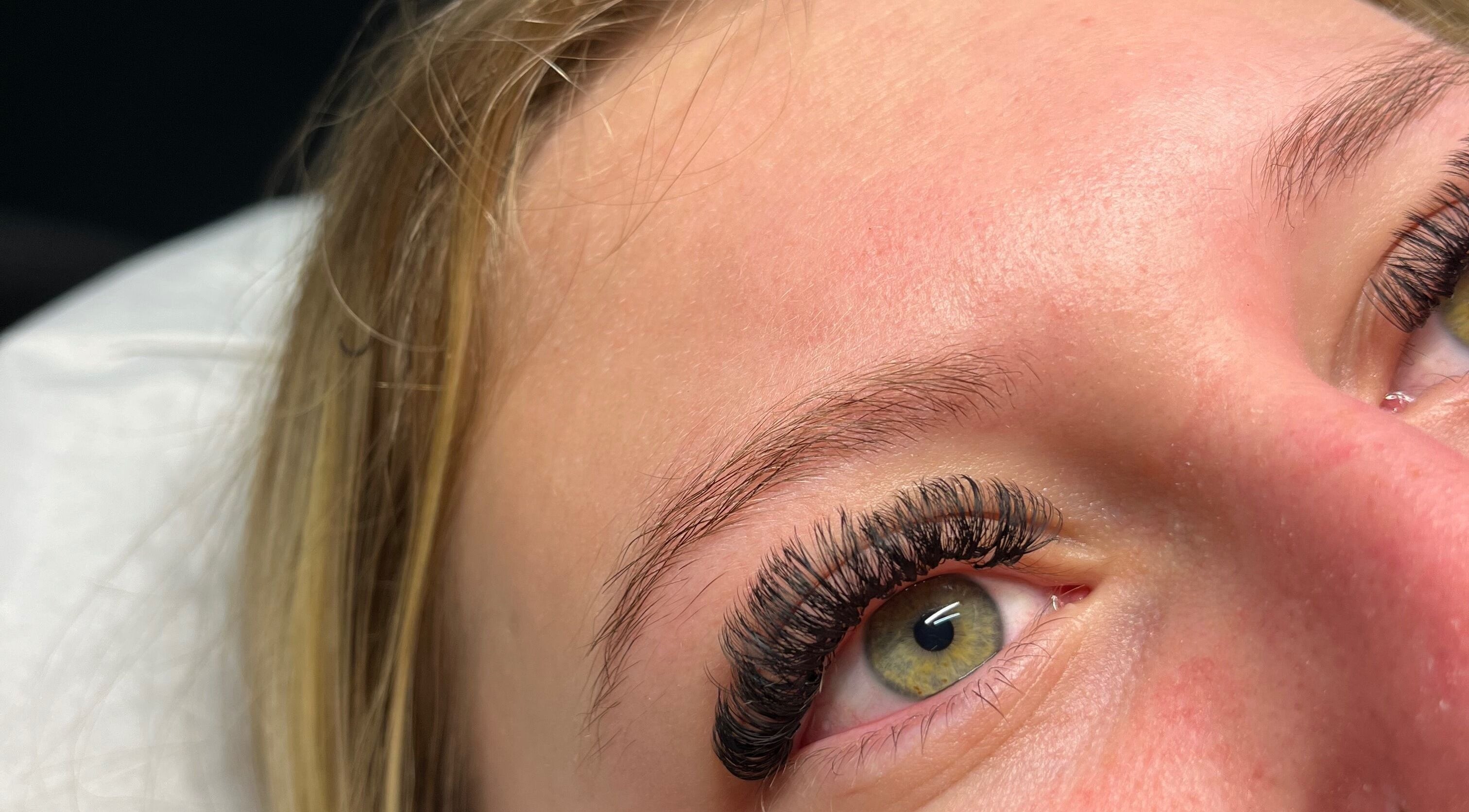 Close-up of lush eyelash extensions at LashedByGrace, Brighton And Hove, England, GB.