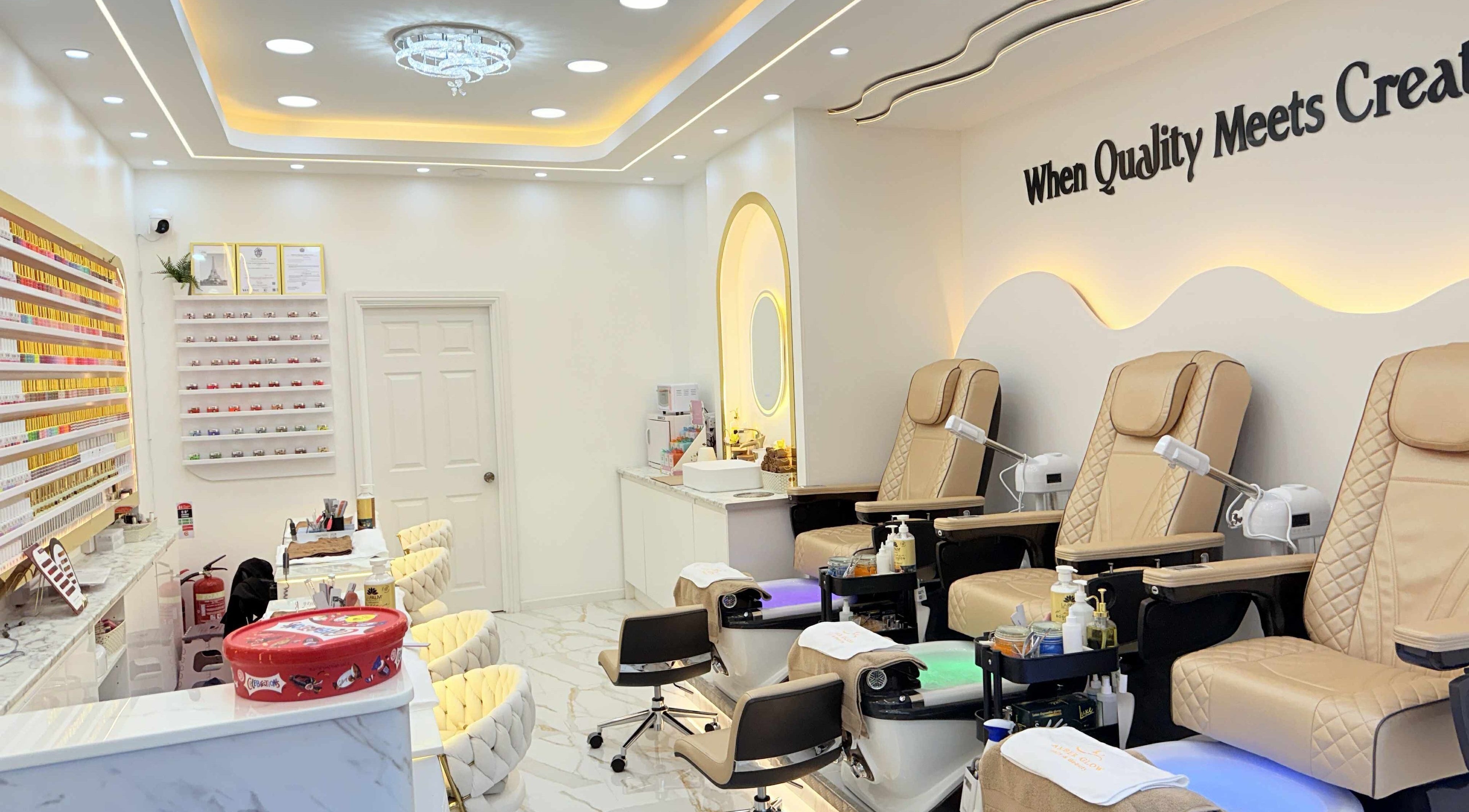 Amber Glow Nails & Beauty, London, England, GB: luxurious nail salon with plush seating and modern décor.