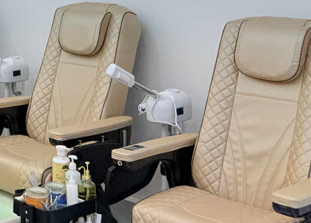 Elegant pedicure chairs at Amber Glow Nails & Beauty in London, England, GB, offering utmost comfort.