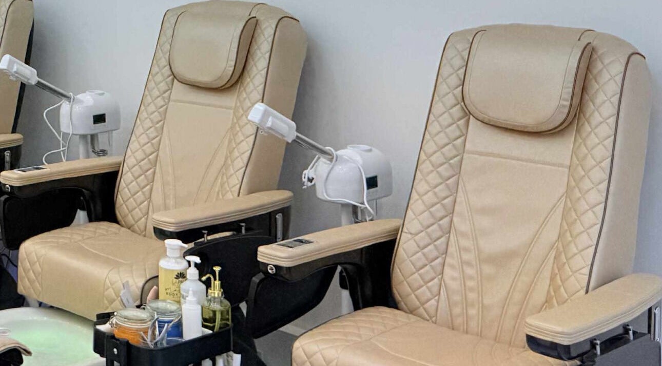 Elegant pedicure chairs at Amber Glow Nails & Beauty in London, England, GB, offering utmost comfort.