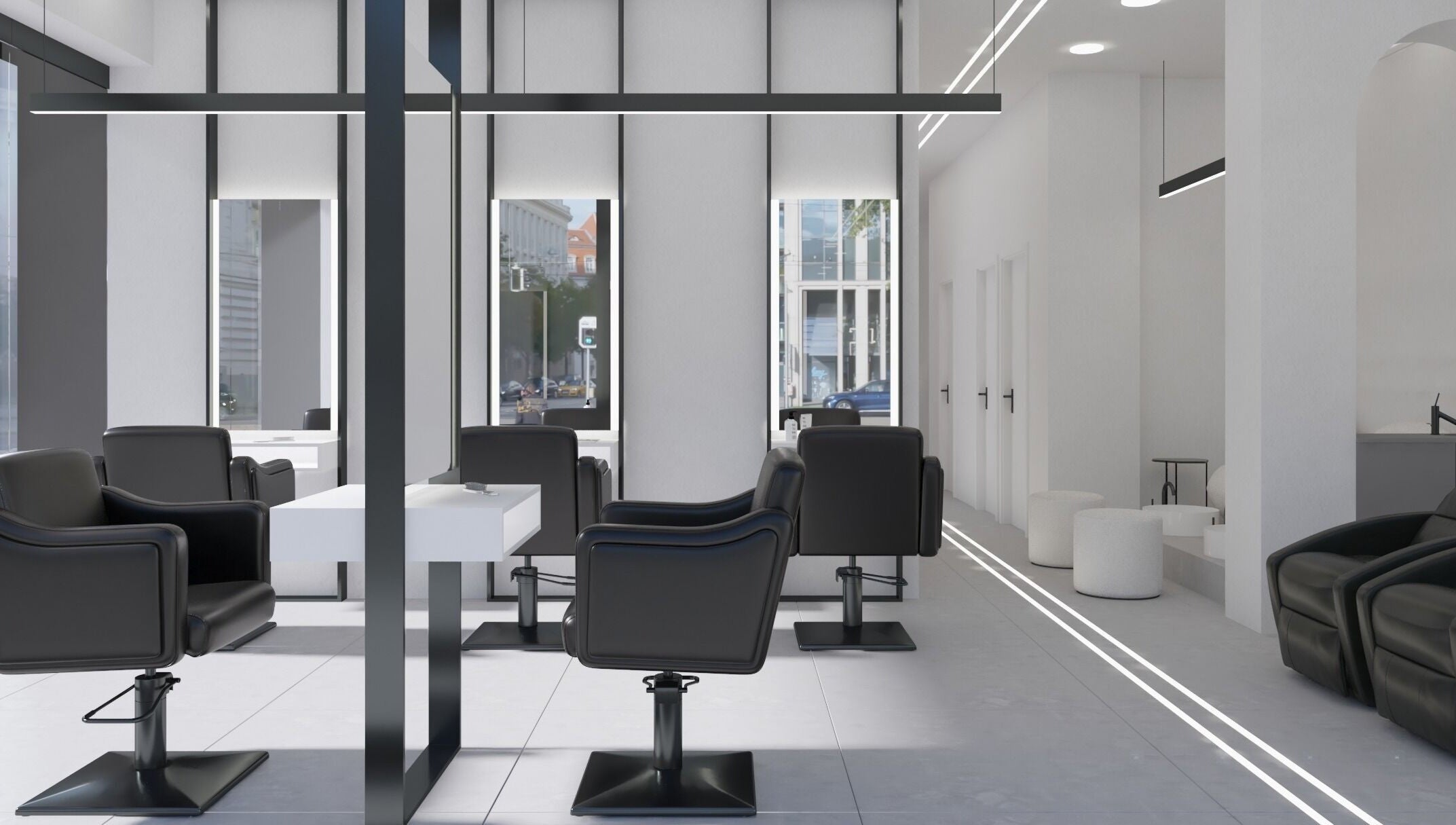 Καλαίσθητο εσωτερικό του MEDUSA BARBER TRIANDRIA στην Τριανδρία, GR με κομψές μαύρες καρέκλες.