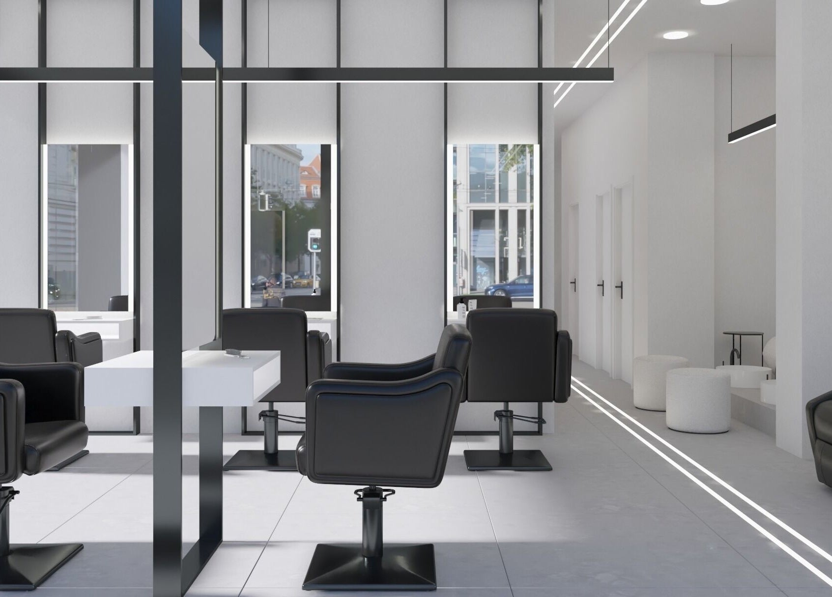 Καλαίσθητο εσωτερικό του MEDUSA BARBER TRIANDRIA στην Τριανδρία, GR με κομψές μαύρες καρέκλες.