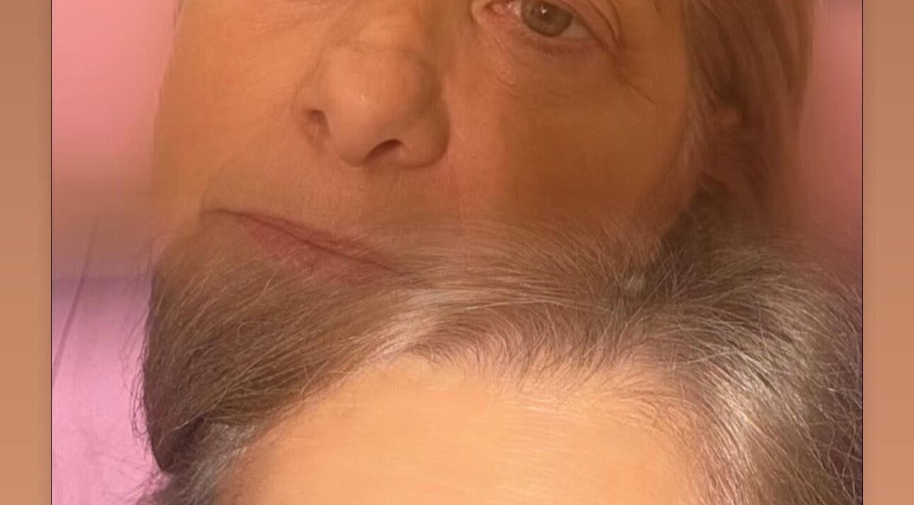 Close-up portrait capturing relaxation at Doll Faced, GB, showcasing subtle elegance and calmness.