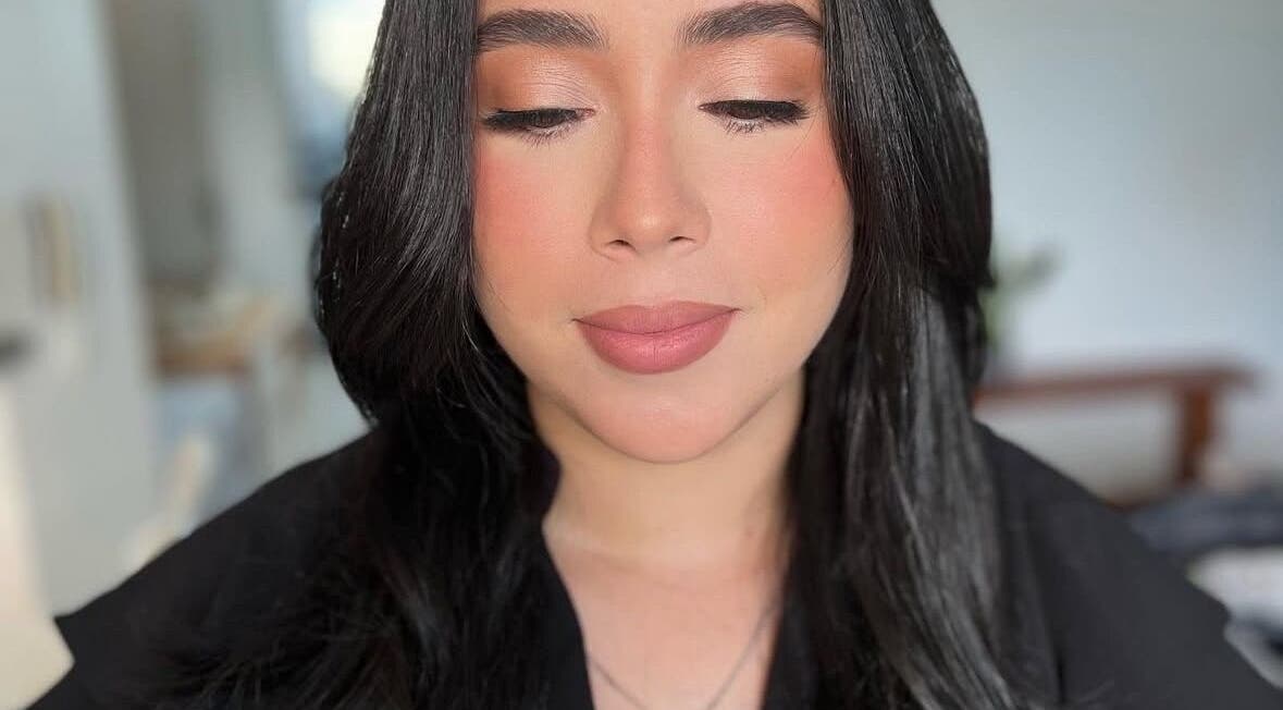 Close-up of a serene face with flawless makeup by Yageiry in Jarabacoa, La Vega Province, DO.