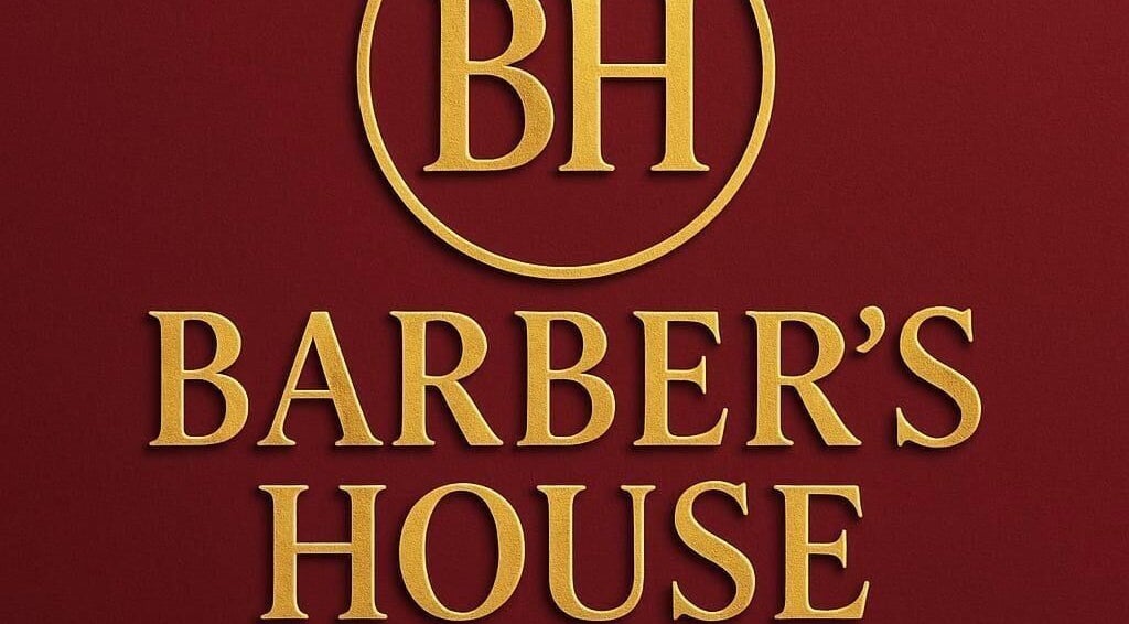 Elegant Barber's House VIP logo in gold on rich maroon, Bogotá, D.C., CO.