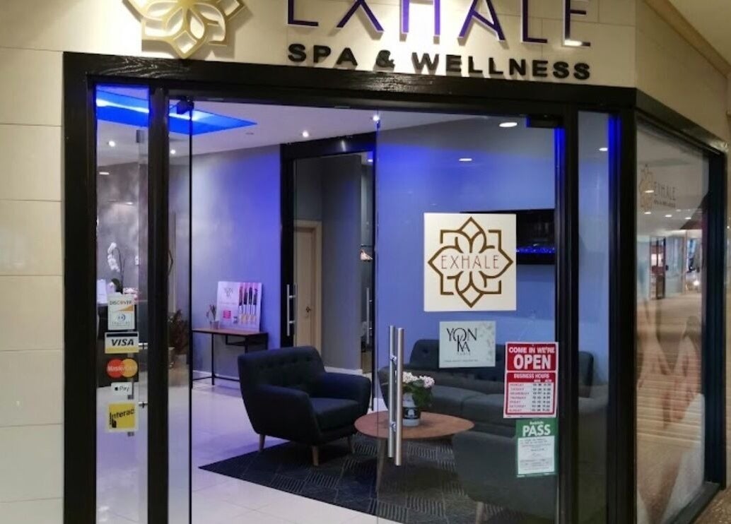 Entrance of Exhale Spa and WellnessElite in Toronto, Ontario, CA, showcasing a cozy interior and welcoming ambiance.