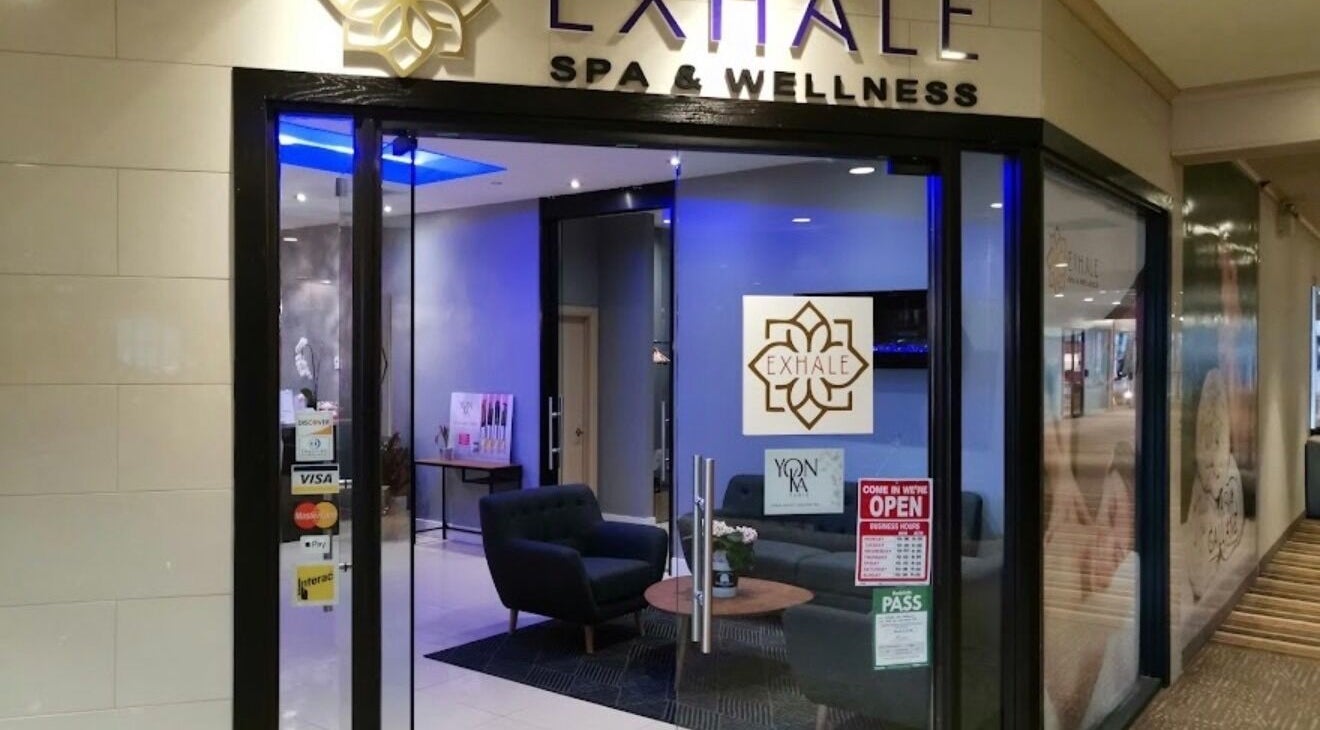 Entrance of Exhale Spa and WellnessElite in Toronto, Ontario, CA, showcasing a cozy interior and welcoming ambiance.