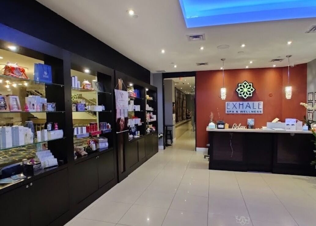 Welcoming interior of Exhale Spa and WellnessElite in Toronto, Ontario, CA with elegant decor and products on display.