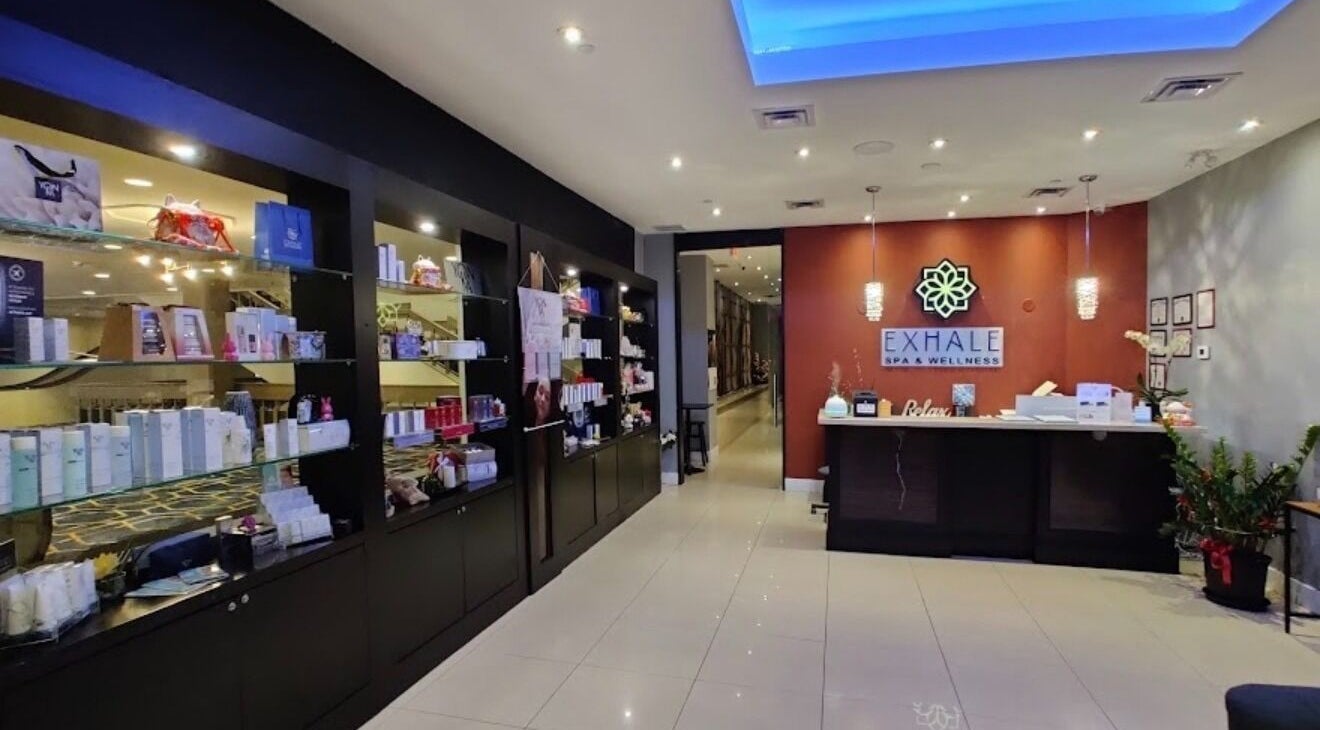 Welcoming interior of Exhale Spa and WellnessElite in Toronto, Ontario, CA with elegant decor and products on display.