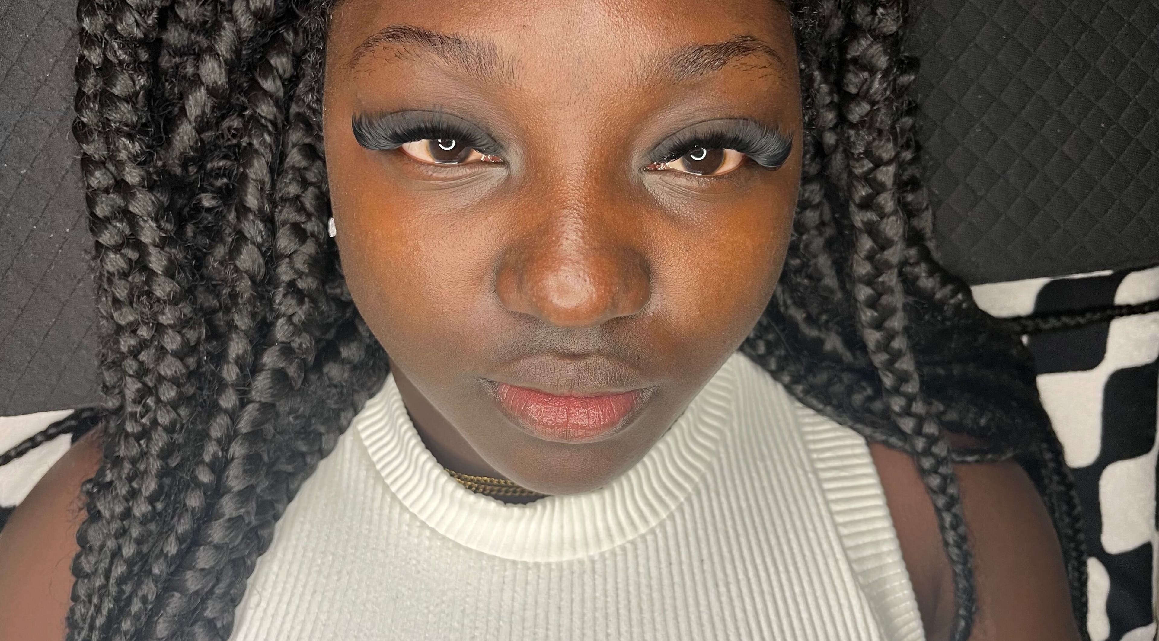 Close-up of a woman with styled eyelashes at nudíor, Bridgetown, Saint Michael, BB.