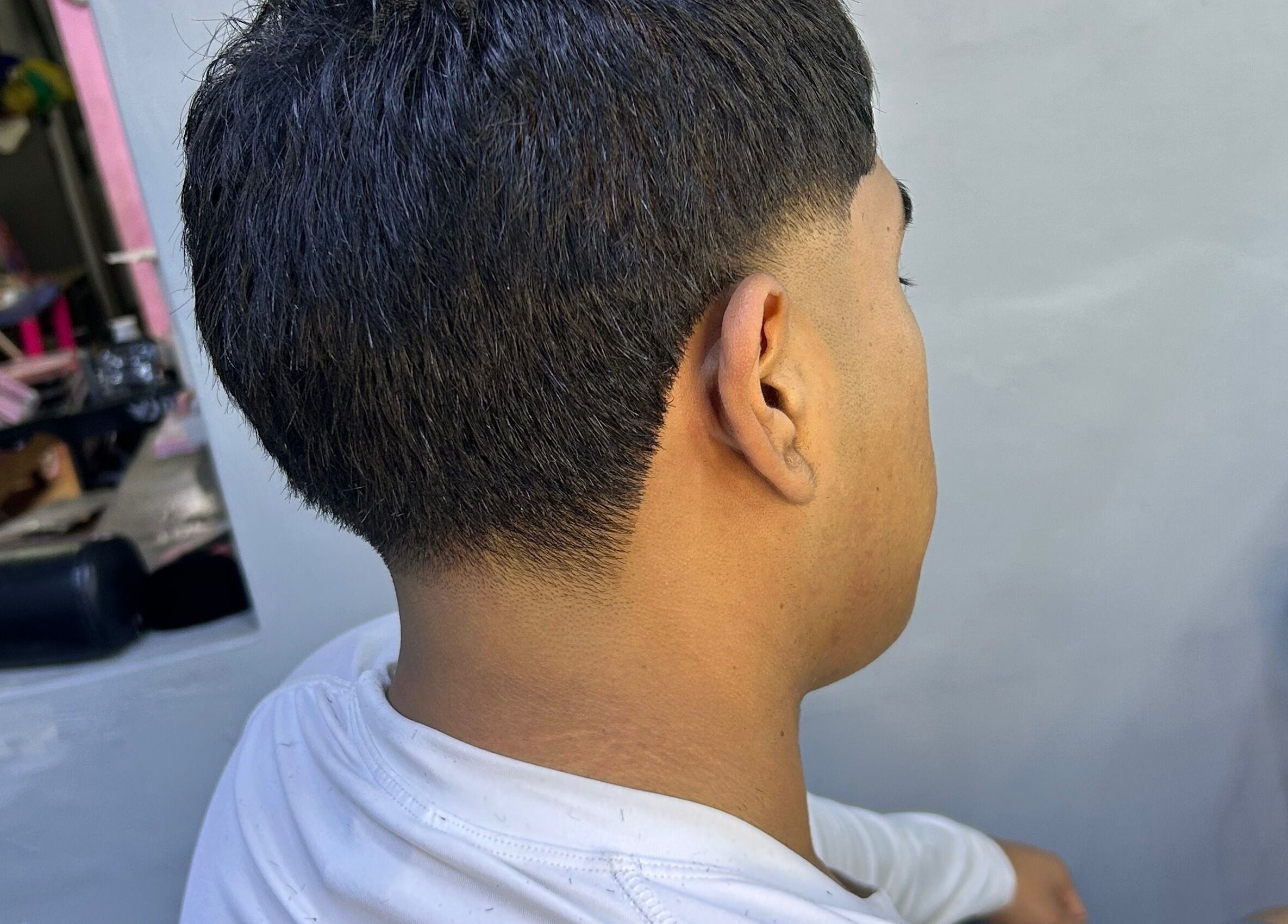 Corte de cabello moderno en Reset Barber, Callao, Callao, PE, mostrando un acabado preciso y elegante.