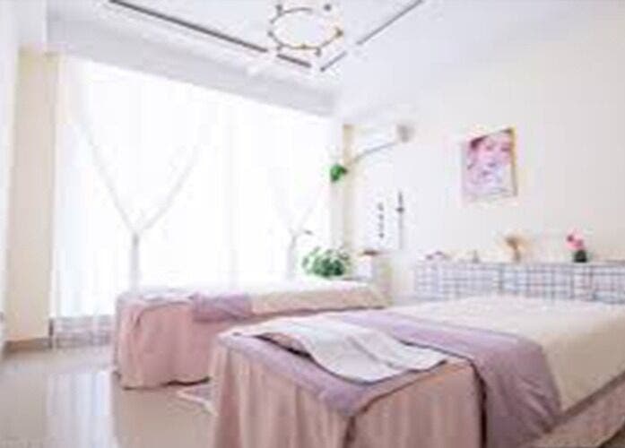 Elegant treatment room at Big Beauty Hair Care, Quincy, Massachusetts, US with soft lighting and cozy beds.