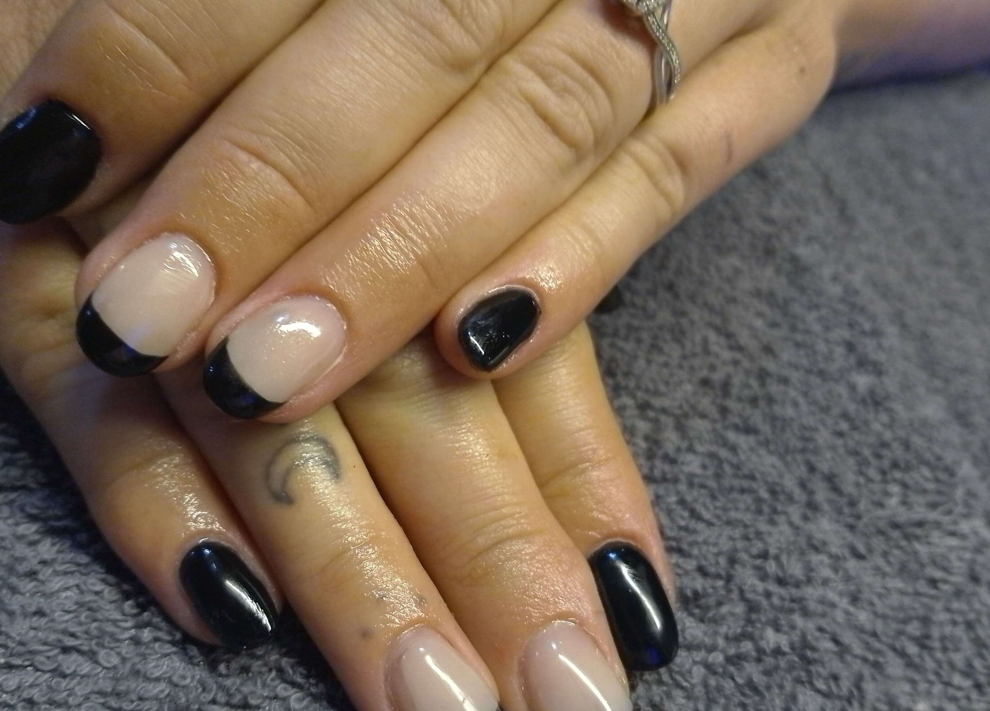 Elegant black and nude manicure at Beauty Hause in Alberton, Gauteng, ZA, showcasing expert nail artistry.