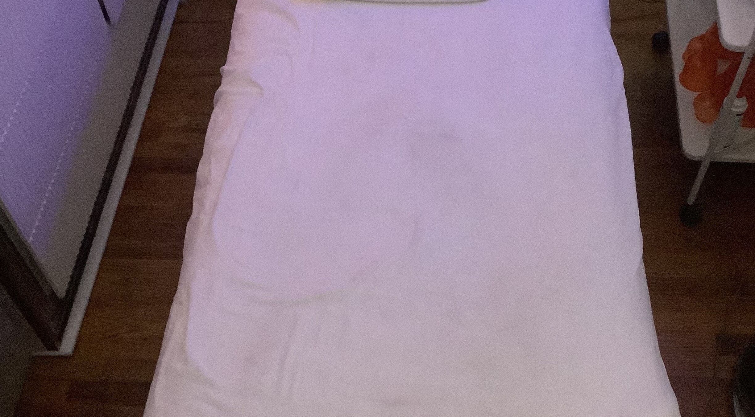 Relaxing massage bed at Brooklyn wellness massage, New York, New York, US, offers soothing tranquility.