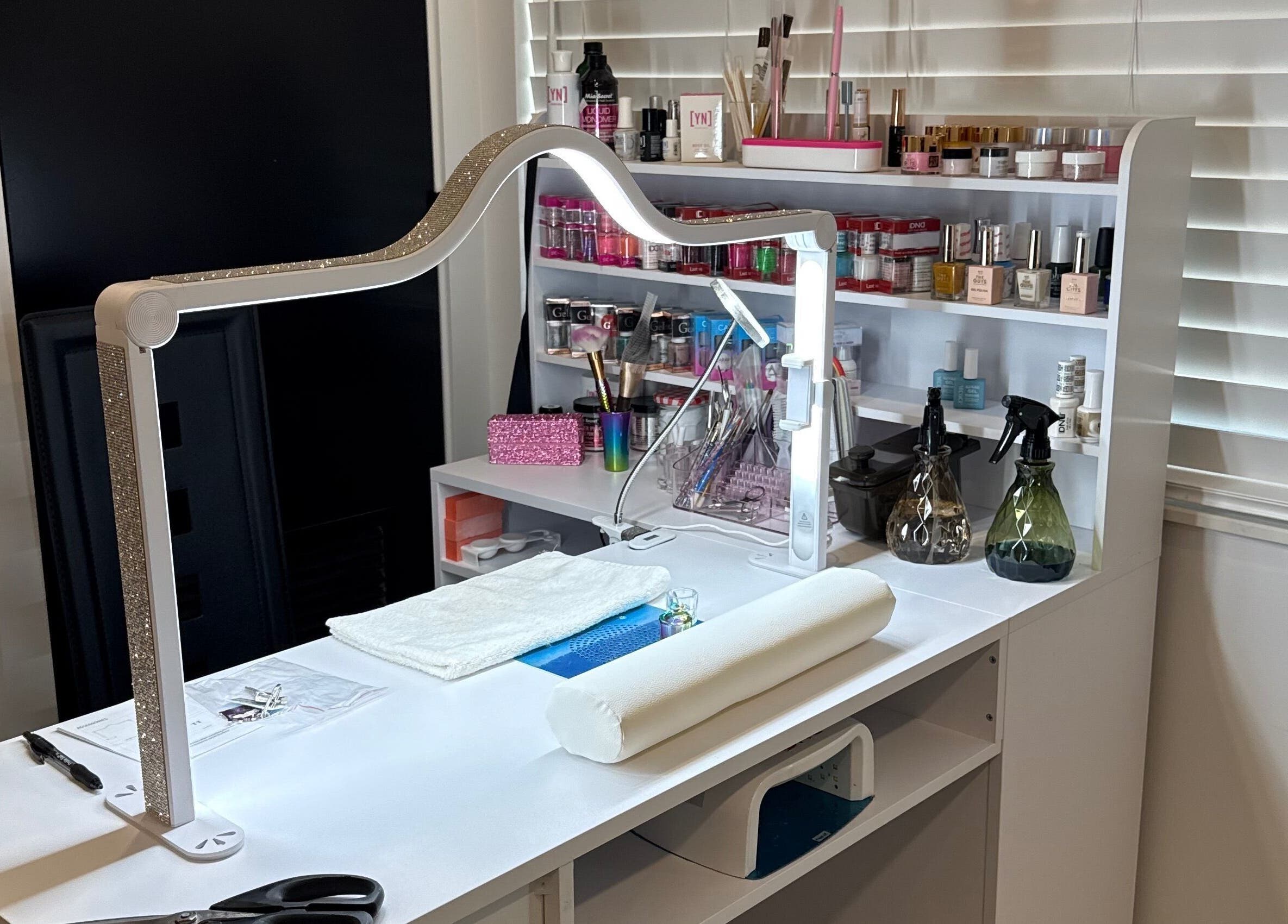 Yanet Nail Studio's elegant nail station setup in West Palm Beach, Florida, US with tools and products.