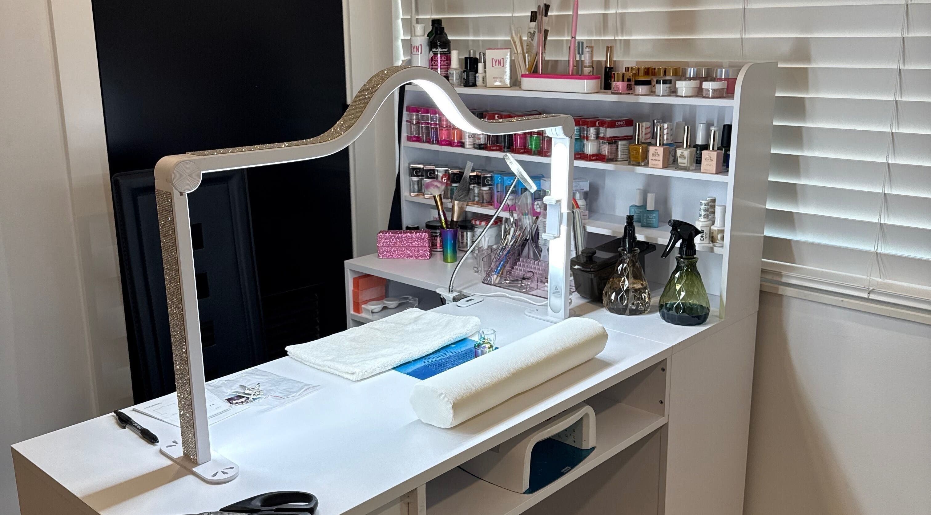 Yanet Nail Studio's elegant nail station setup in West Palm Beach, Florida, US with tools and products.