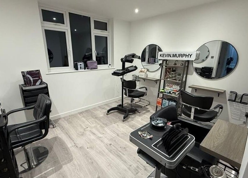 Modern salon interior at Hair By Jen, Jersey, St Saviour, JE, featuring stylish chairs and beauty equipment.