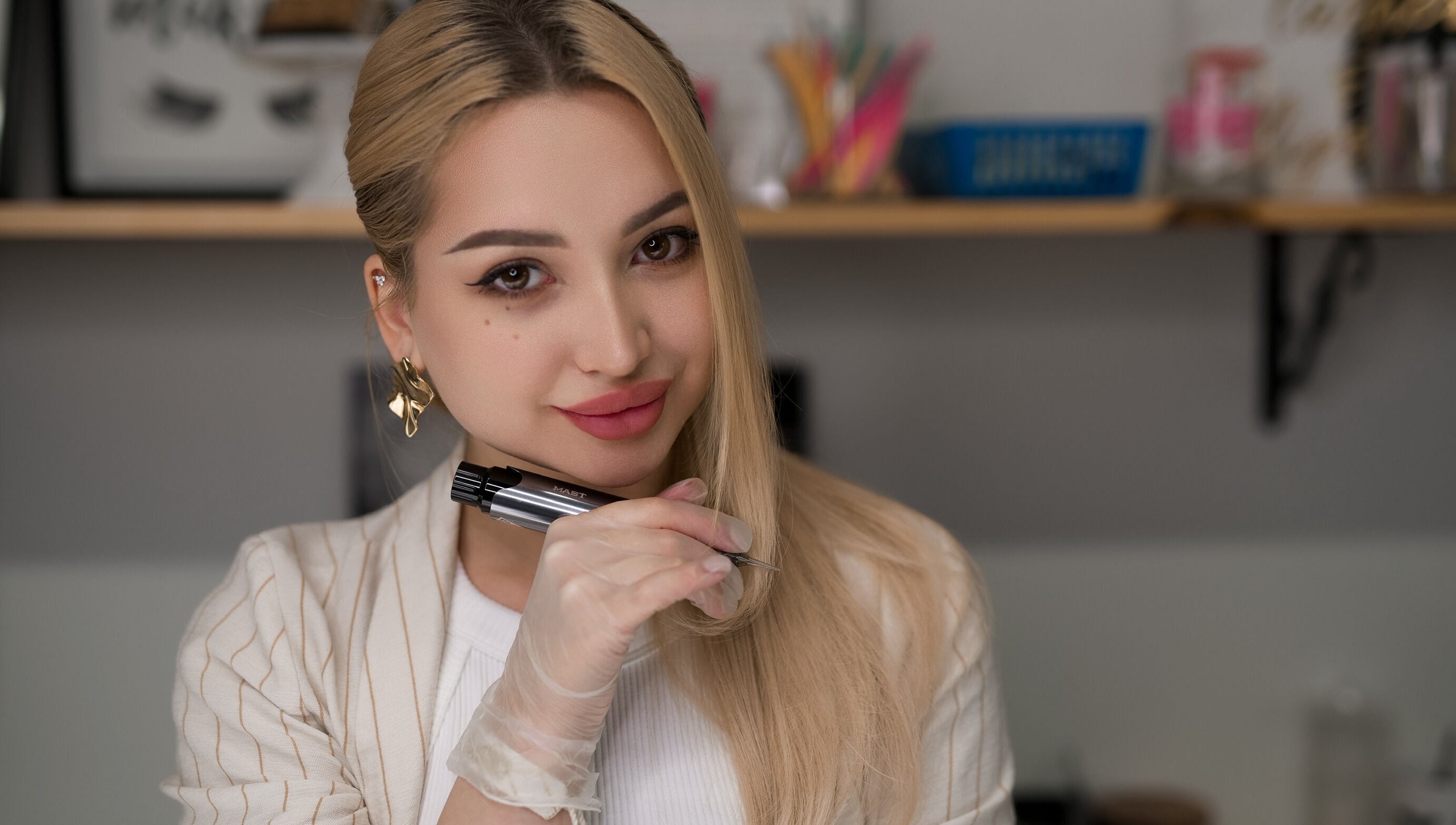 Expert nail artist at Alisha Ink Nails, Palm Harbor, Florida, US, showcasing precision tools.