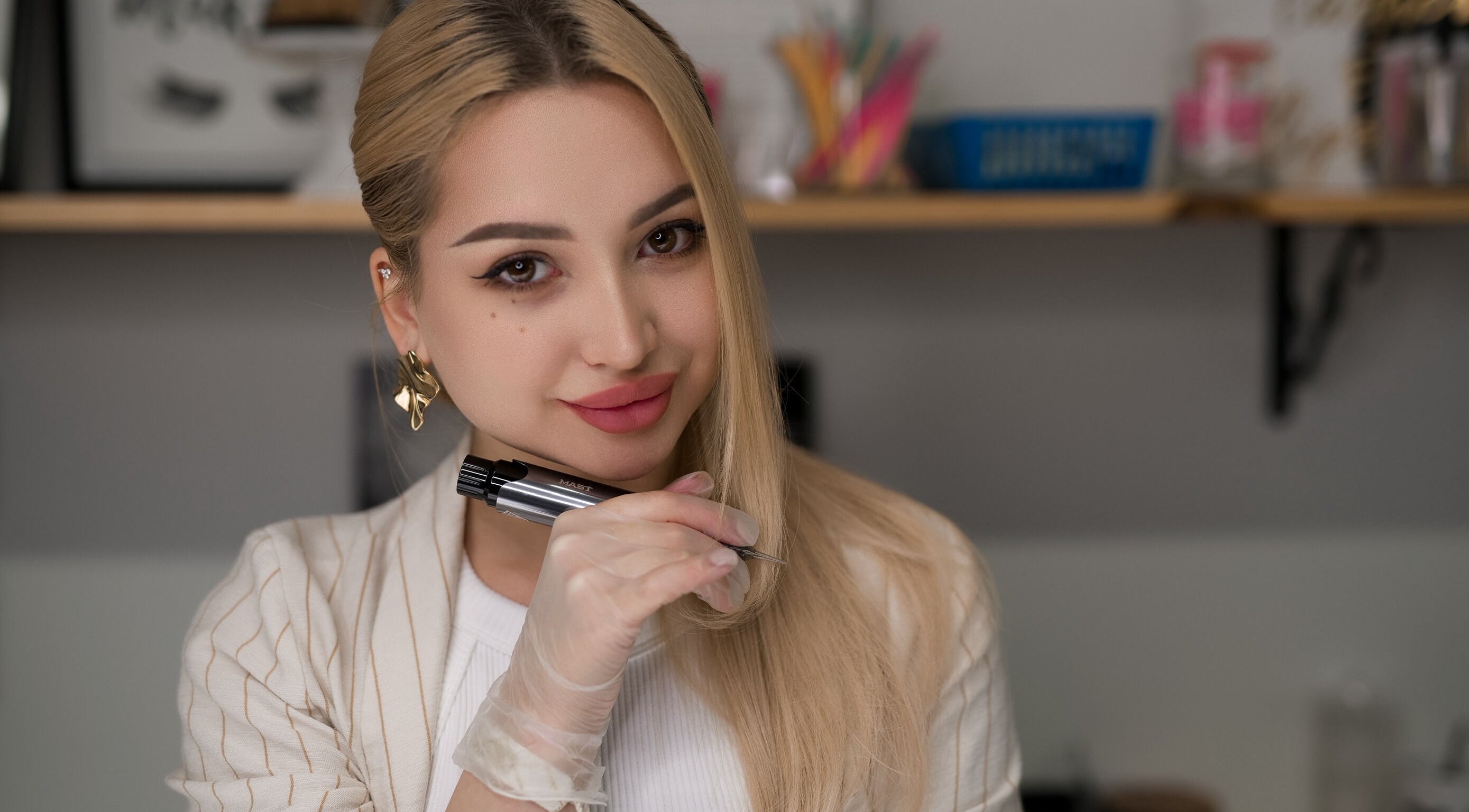 Expert nail artist at Alisha Ink Nails, Palm Harbor, Florida, US, showcasing precision tools.