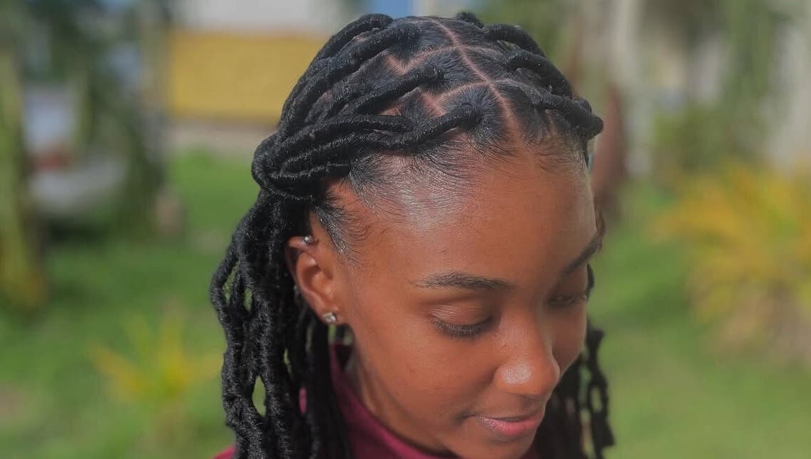 Stylish braided hairstyle at Glambynicia in Chaguanas, Chaguanas, TT, showcasing intricate design.