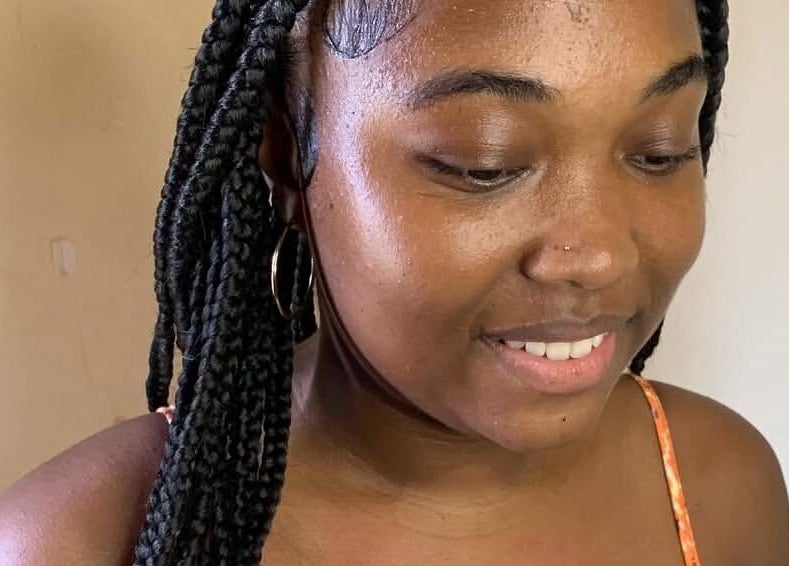 Beautiful braided hairstyle at Glambynicia, Chaguanas, Chaguanas, TT, highlighting natural beauty.