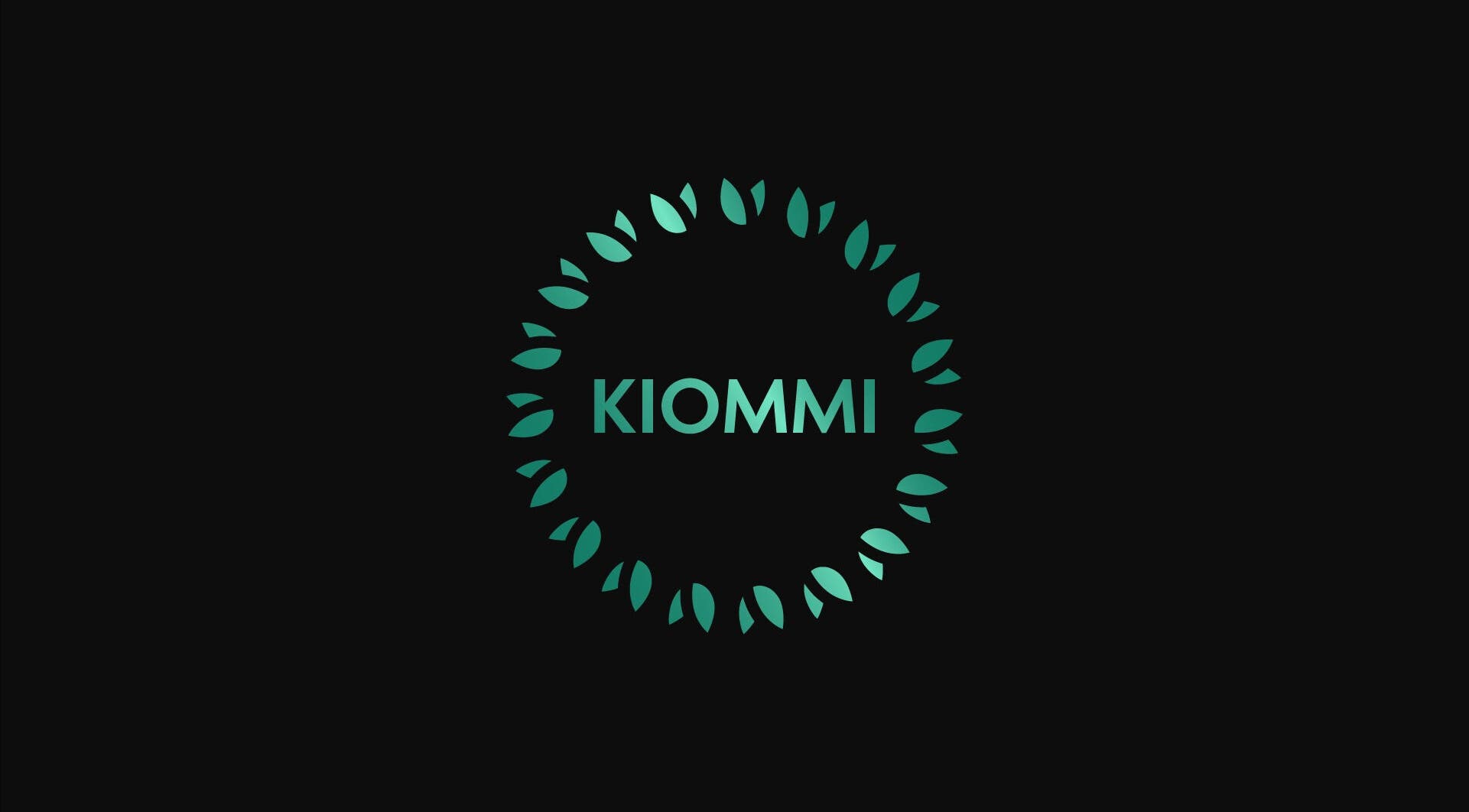 Elegant logo of KIOMMI ltd with circular leaf design in Lagos, Lagos, NG.