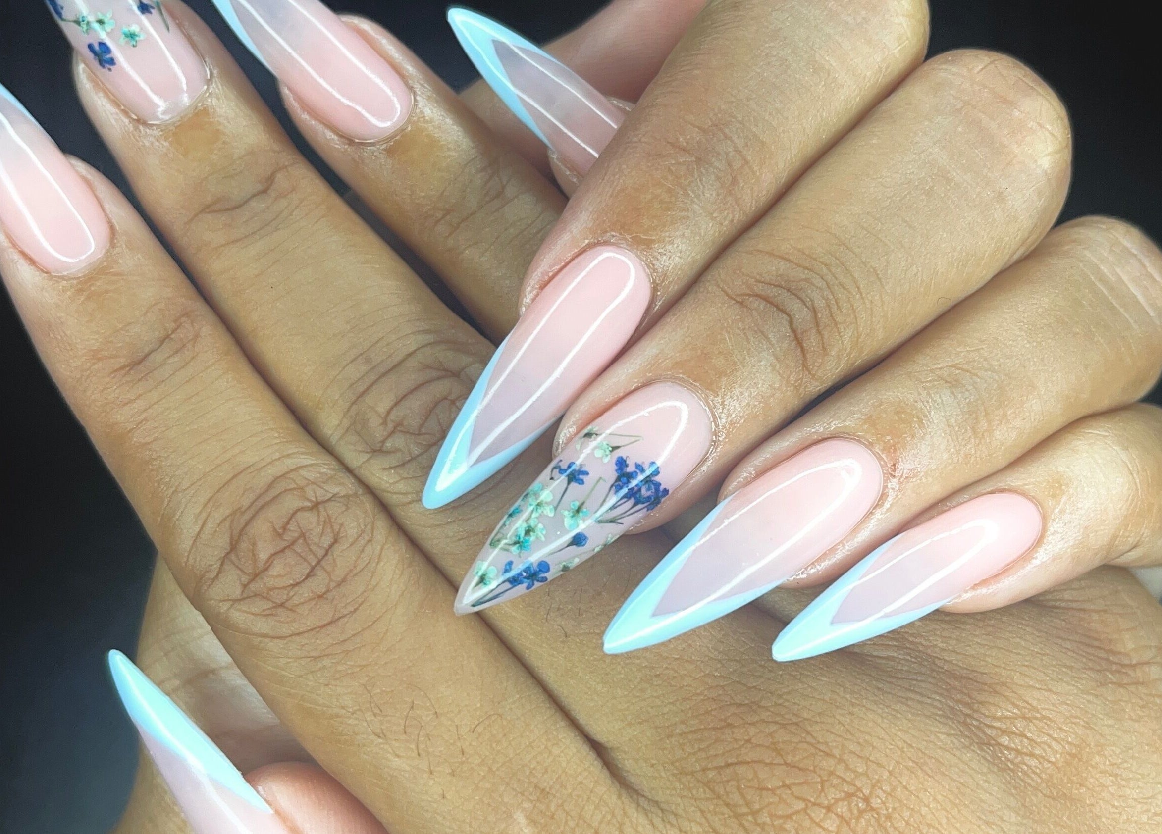 Beautiful stiletto nails with floral art at Nail Therapy by Lilly, Arima, Arima Borough Corporation, TT.