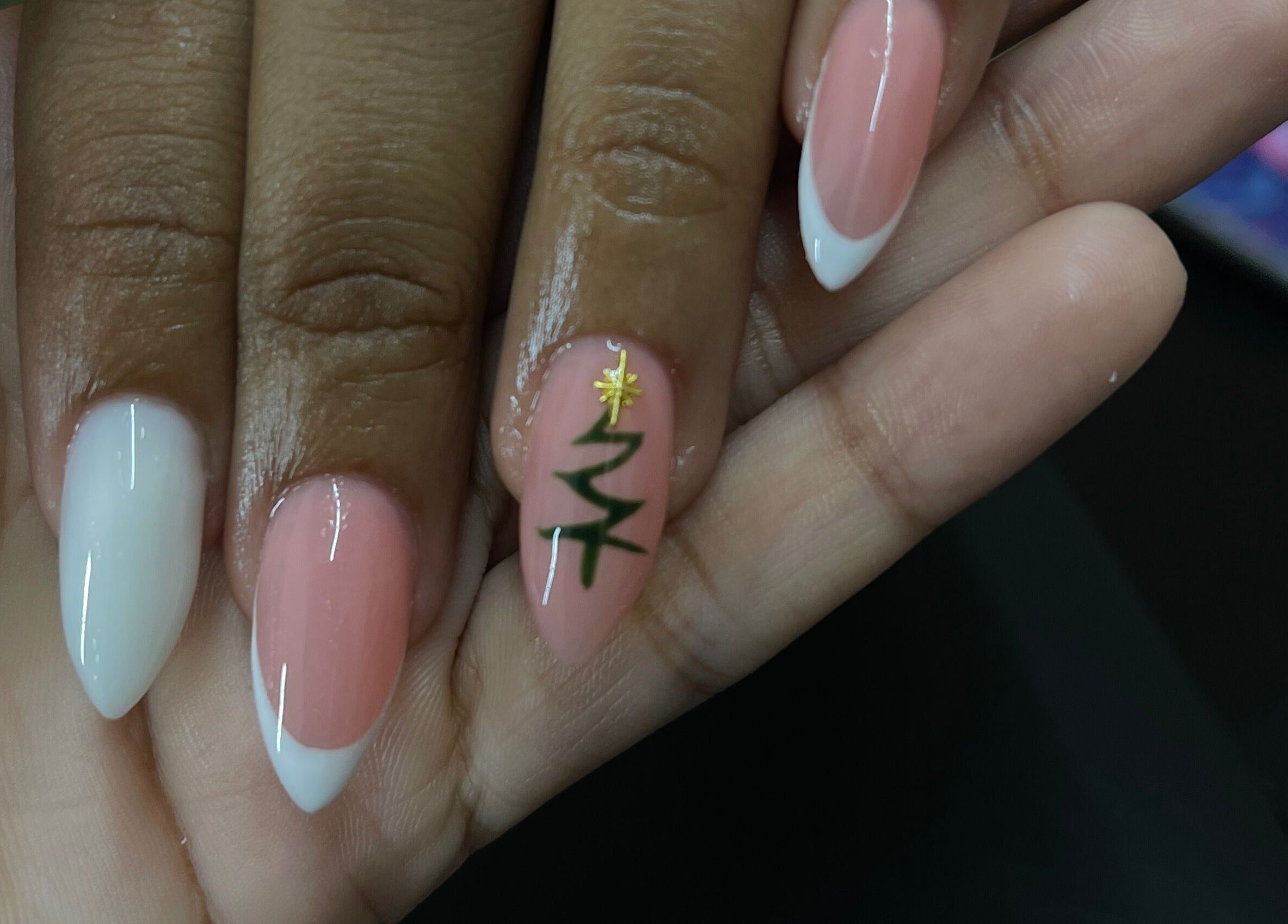 Stylish nail art at Nail Therapy by Lilly, Arima, Arima Borough Corporation, TT. French tips with gold detail.