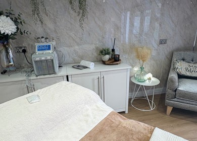 Relaxing treatment room at The Retreat, Barnsley, England, GB with plush seating and soothing decor.