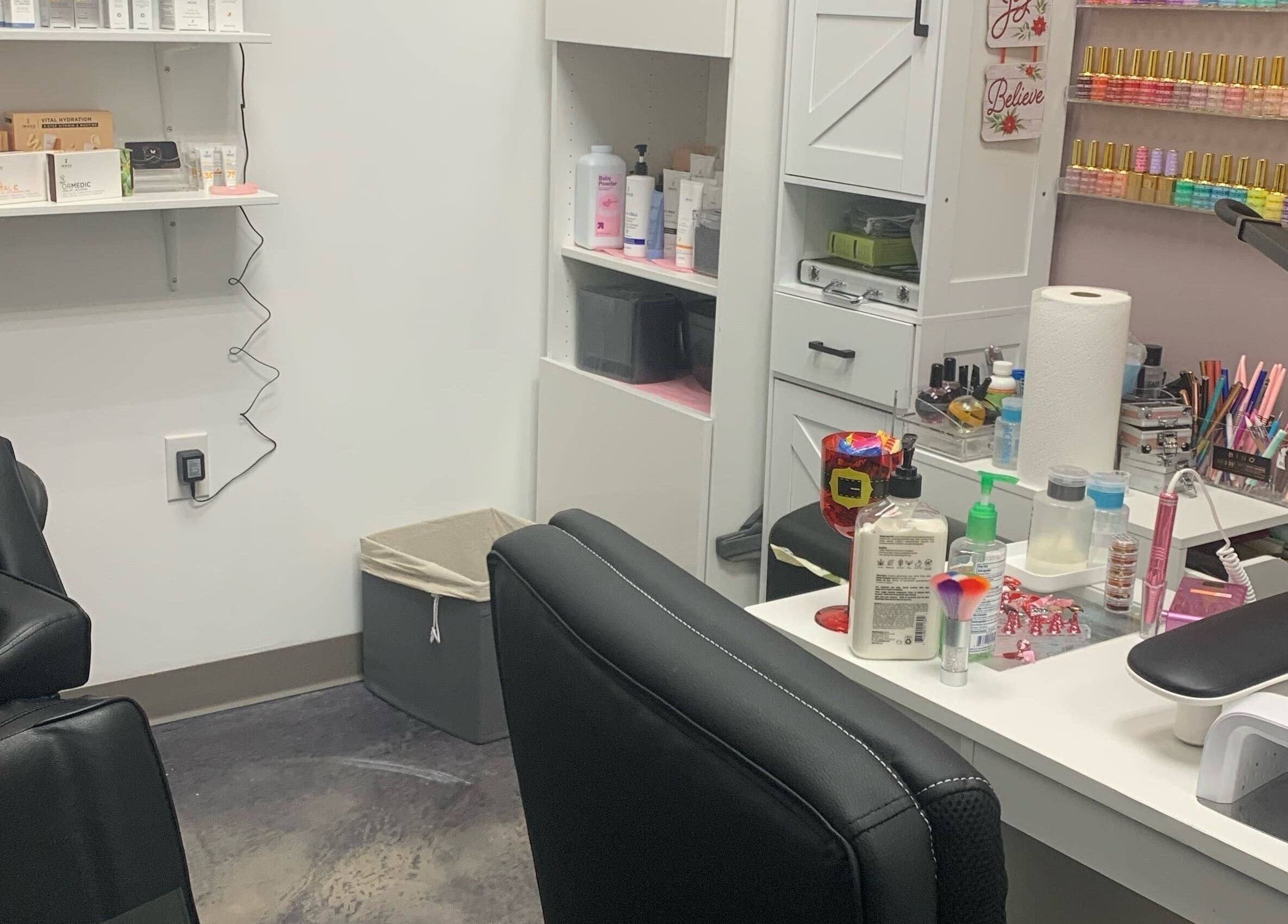 Gloss N Bare Studio's nail station with products in Midvale, Utah, US, showcasing sleek organization.