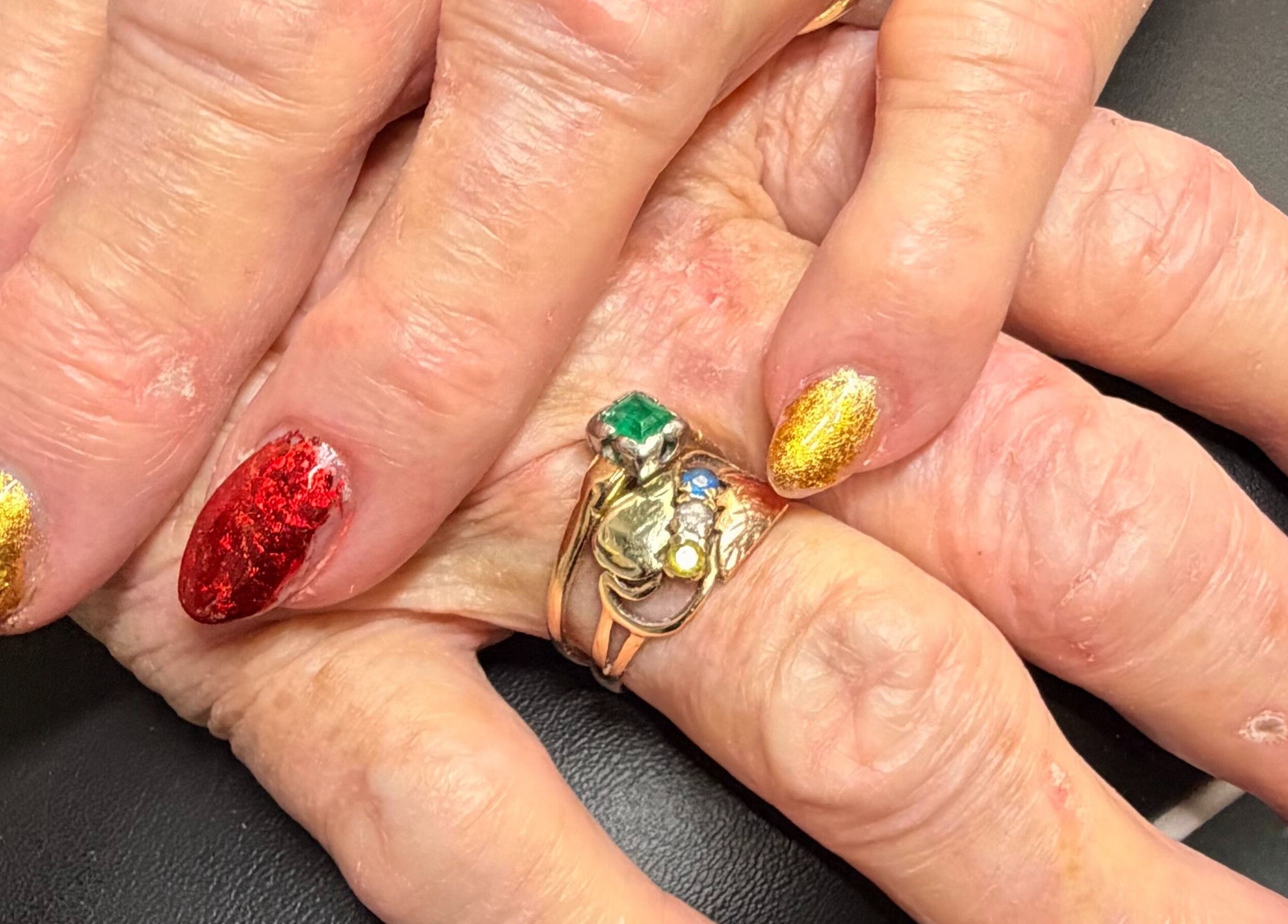 Red and gold festive nails by Nails by Nancy @ Linda's Place in Sandy, Utah, US. Elegant and bright manicure.