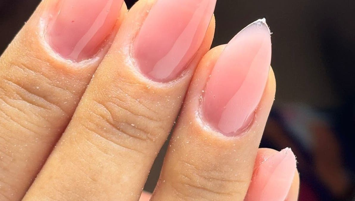 Glossy pink manicure at Nama Nails, Zapopan, Jalisco, MX showcases expert nail artistry.