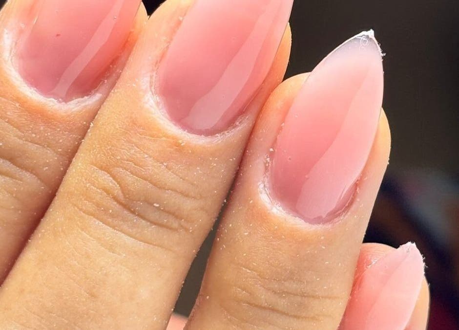 Glossy pink manicure at Nama Nails, Zapopan, Jalisco, MX showcases expert nail artistry.