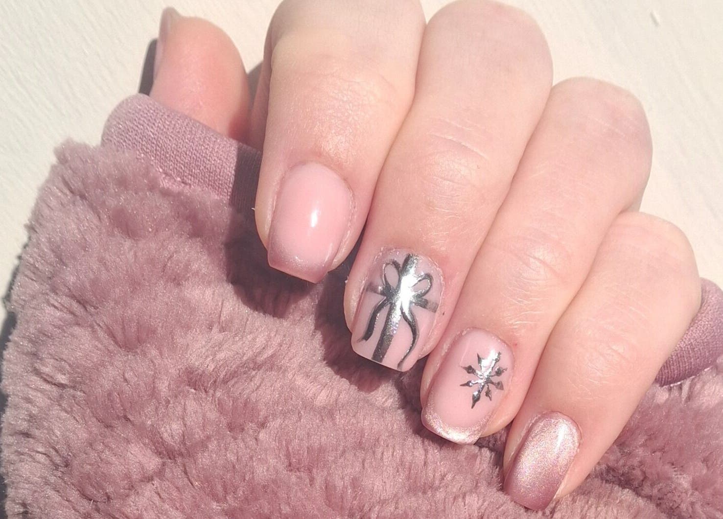 Stylish nail art with silver design at The Toni Touch in Bolton, England, GB.