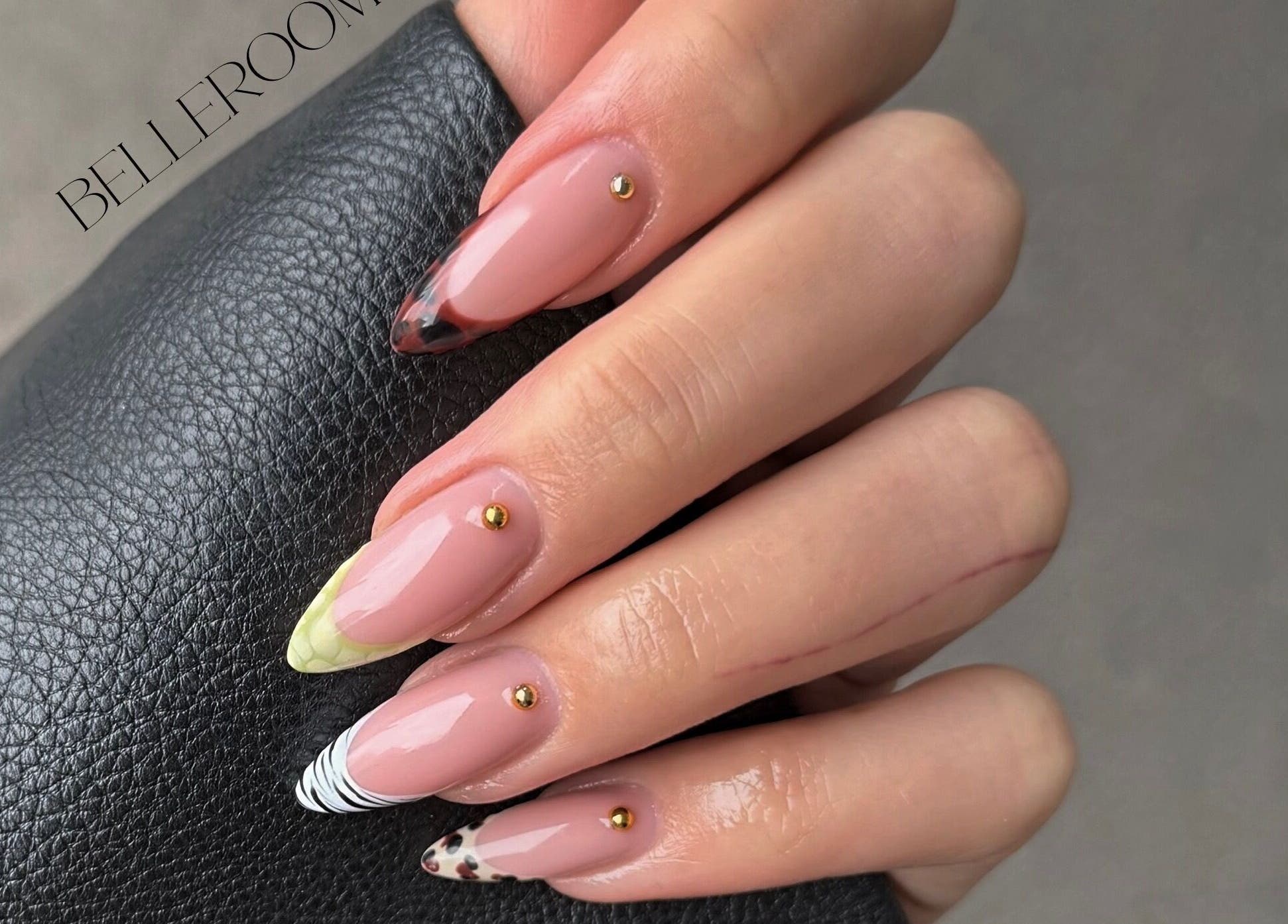 Elegant nail art at Belle Amé Room, Zürich, Zürich, CH with gold accents on ombre nails.