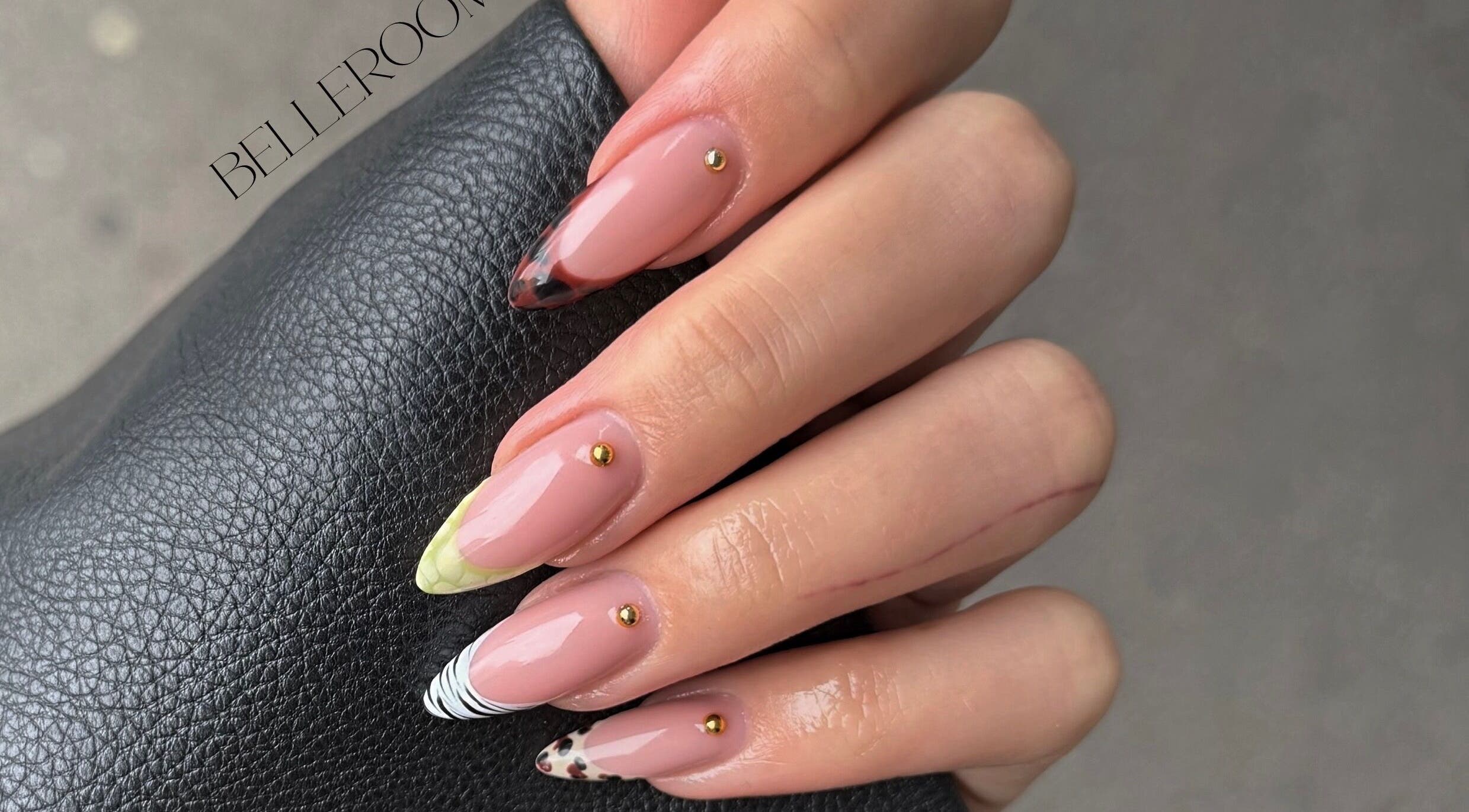 Elegant nail art at Belle Amé Room, Zürich, Zürich, CH with gold accents on ombre nails.