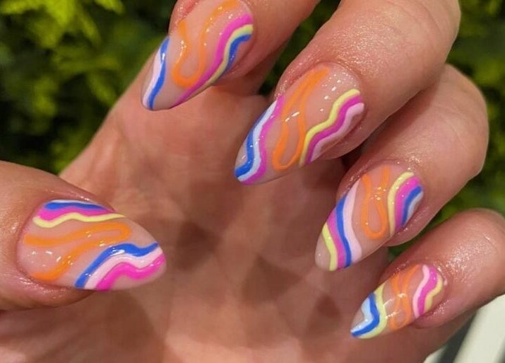 Colorful abstract nail art at Mi Amour, Audenshaw, England, GB showcasing vibrant shades and creativity.