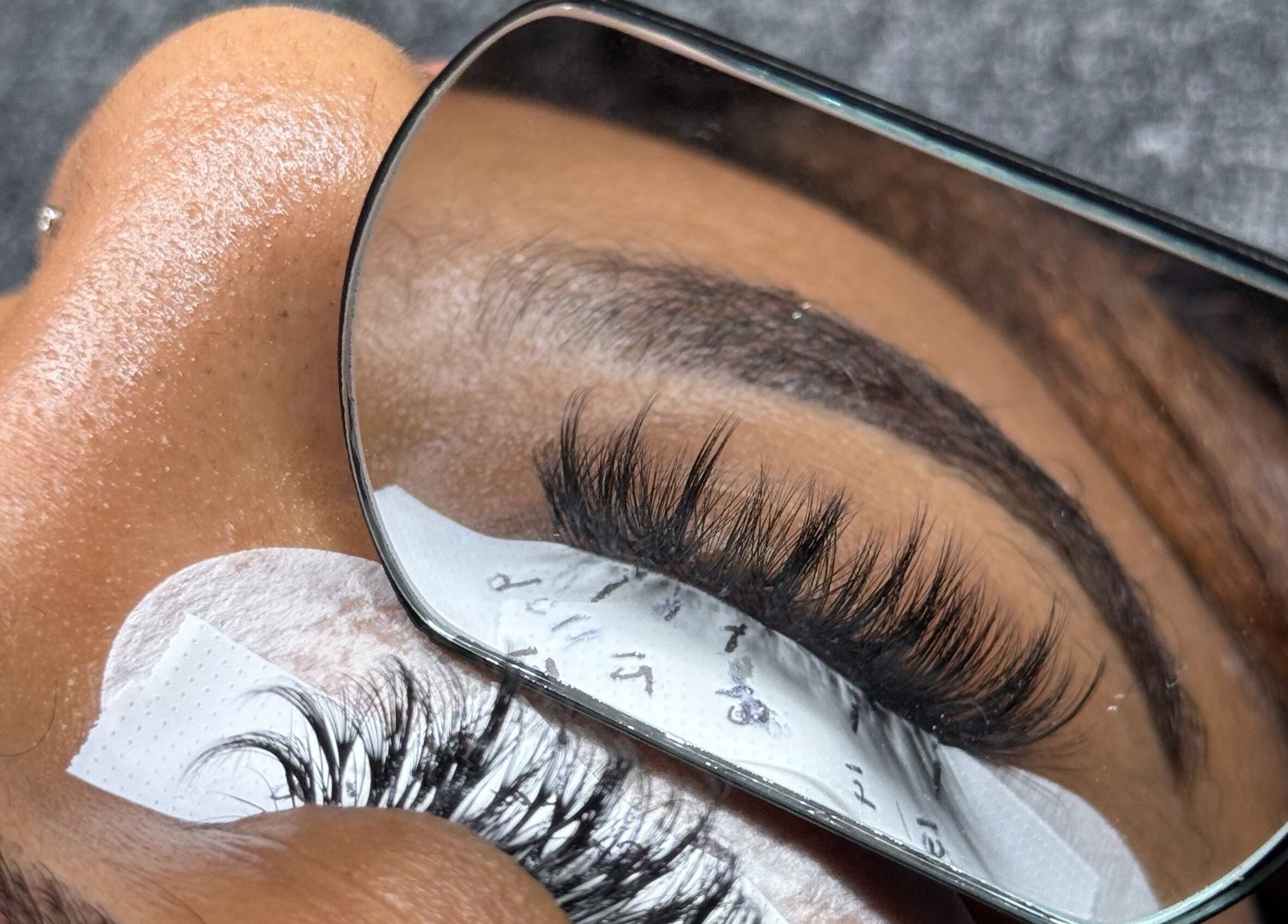 Close-up of eyelash extensions at PHXLASH in London, England, GB, highlighting detailed lash artistry.