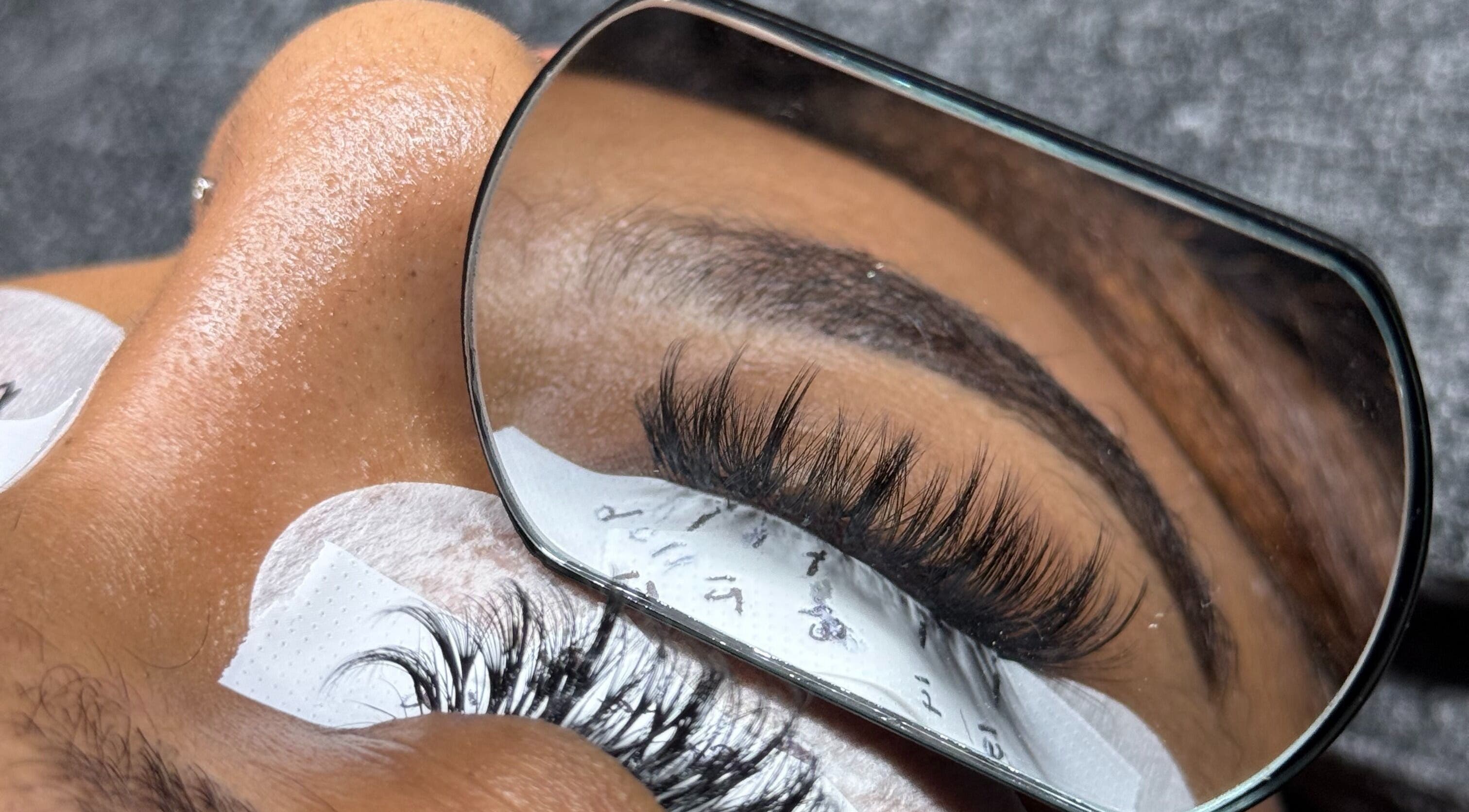 Close-up of eyelash extensions at PHXLASH in London, England, GB, highlighting detailed lash artistry.