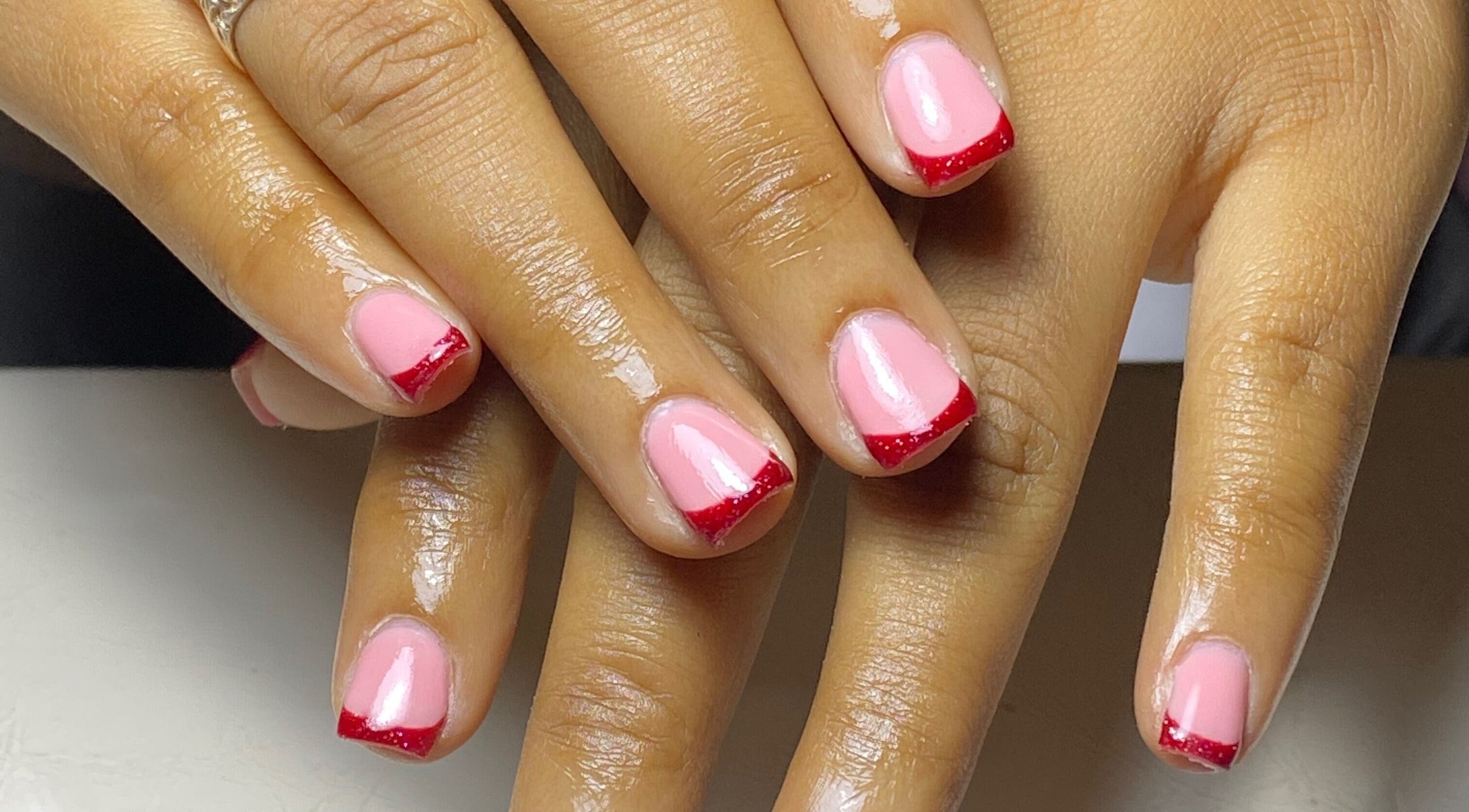 Glossy nail design with pink and red tips at Glossy, Paramaribo, Paramaribo, SR.