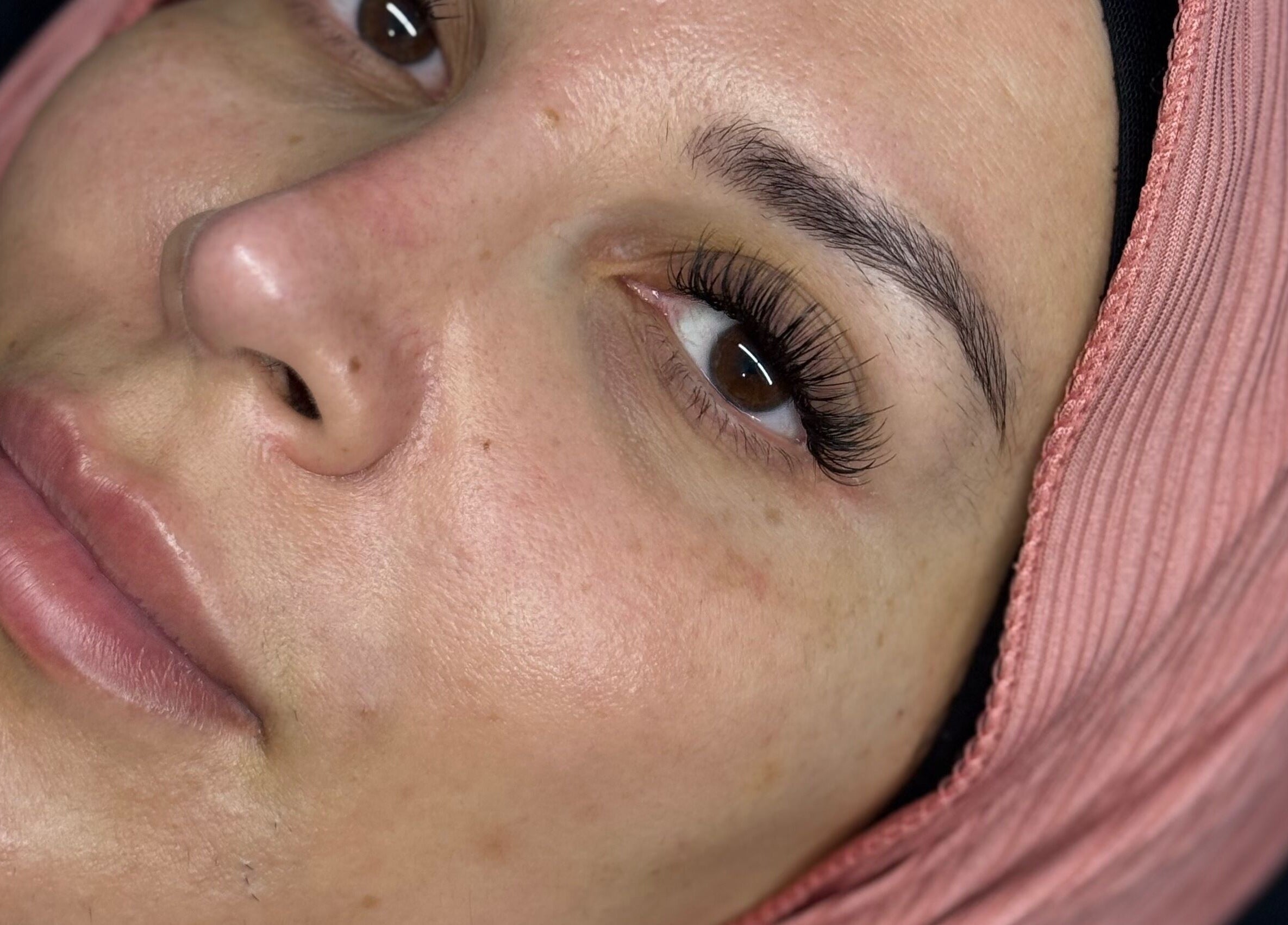 Close-up of a woman with lush eyelashes at Chunni, Stockport, England, GB.