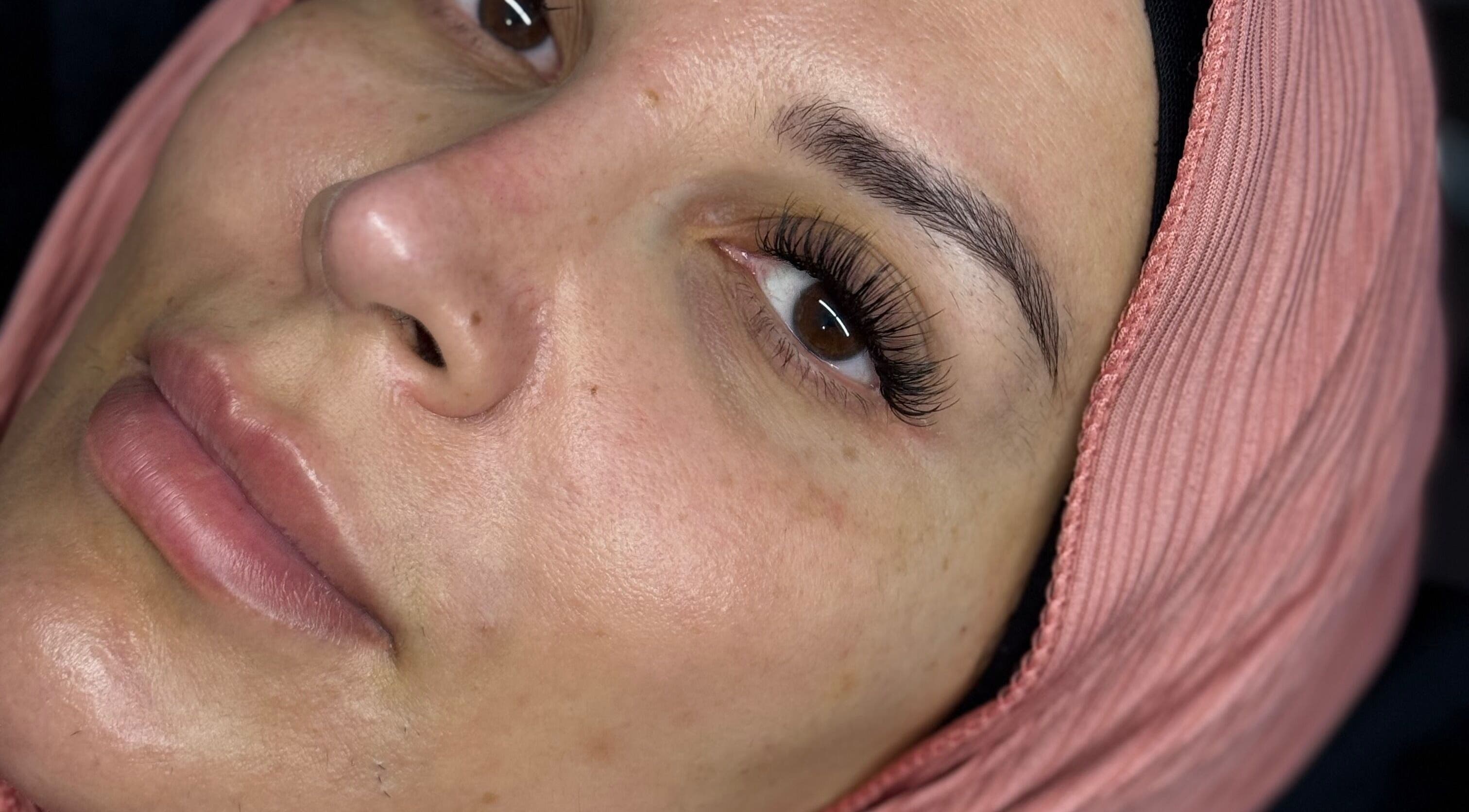 Close-up of a woman with lush eyelashes at Chunni, Stockport, England, GB.