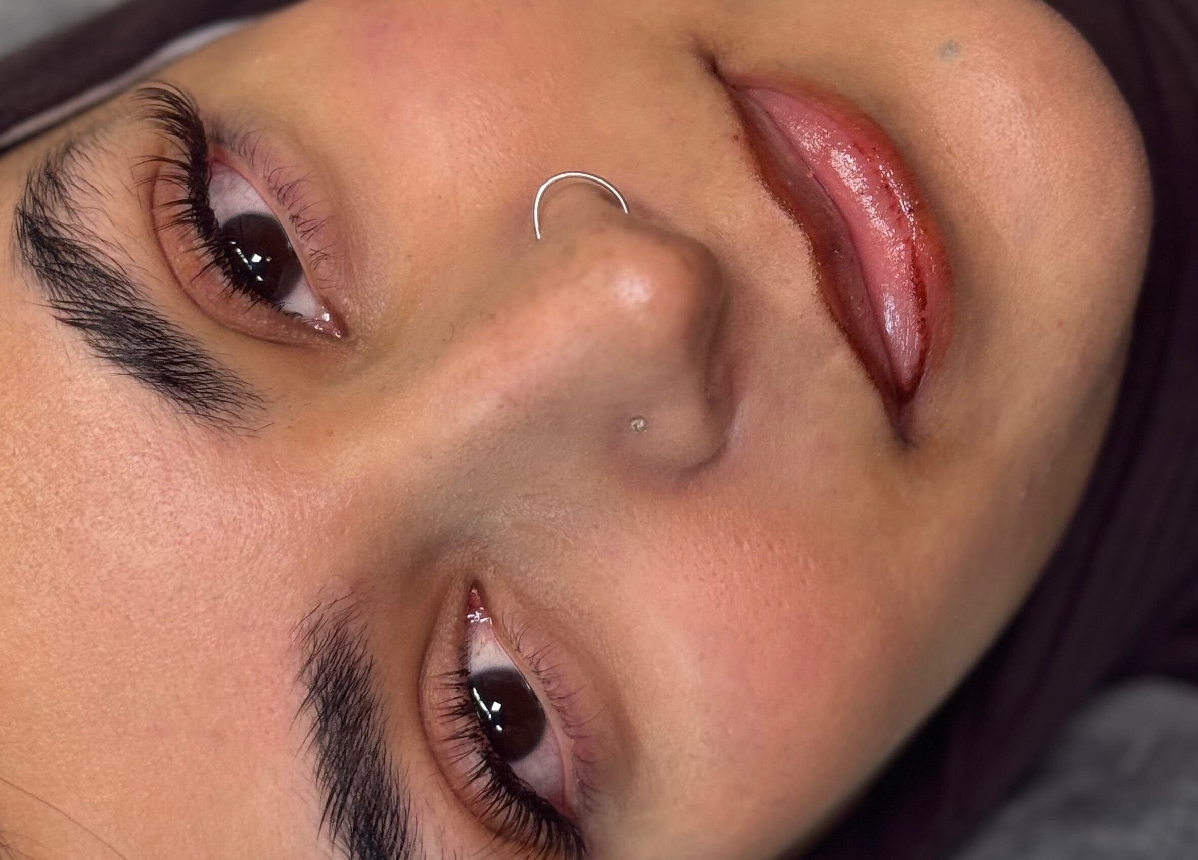 Close-up of well-groomed eyebrows and lashes at Chunni, Stockport, England, GB.
