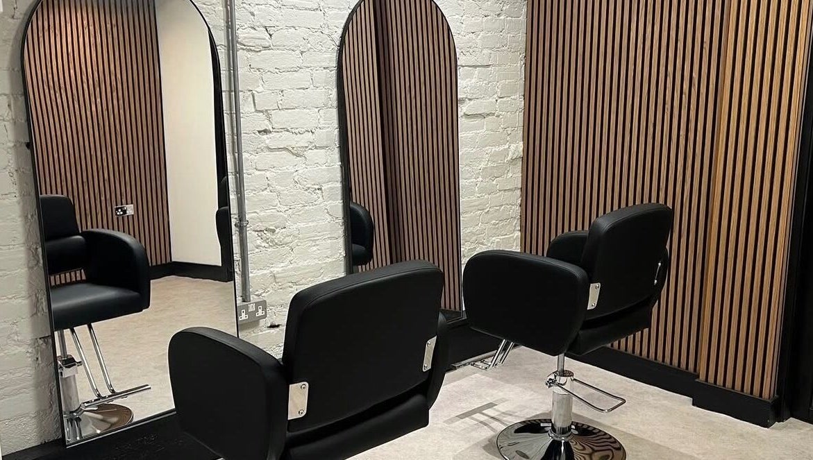 Elegant salon chairs and mirrors at Alder Hills- Essence of Beauty, Poole, England, GB.